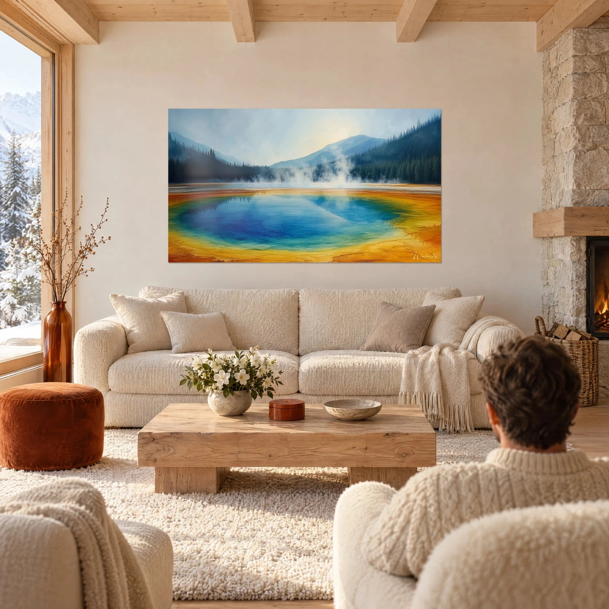 Wall art hot spring with orange and cobalt blue rings, steam over the pines, two people seen from behind, above a sofa in a bright living room