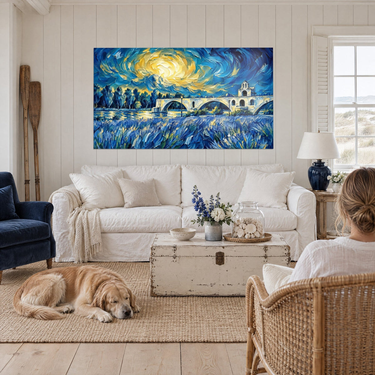 Wall art Avignon bridge in thick blue and gold impasto, spiralling sky, blue lavender, above a sofa in a bright living room