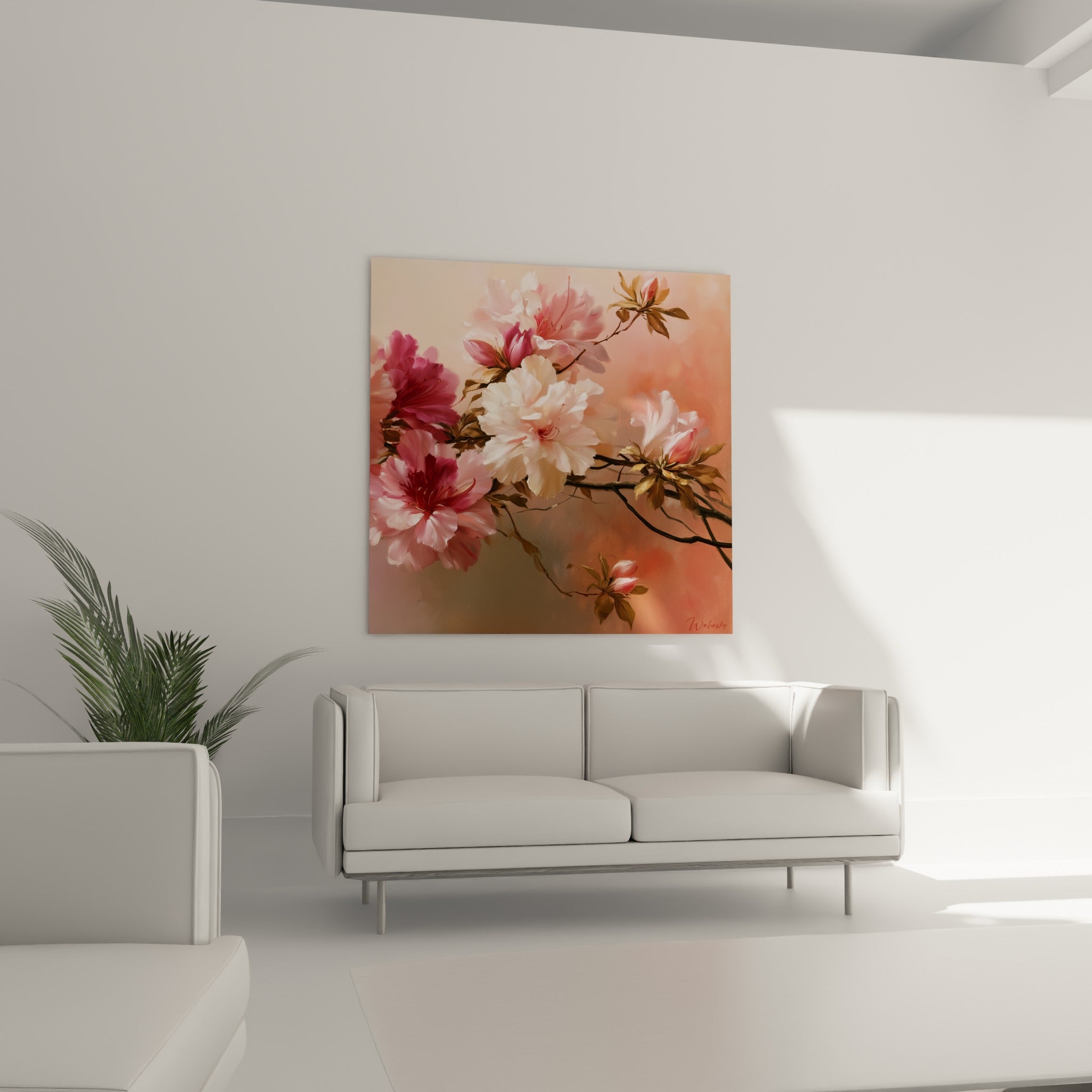 Fleurs d'azalées roses et blanches accrochées au-dessus d'un canapé dans un salon lumineux