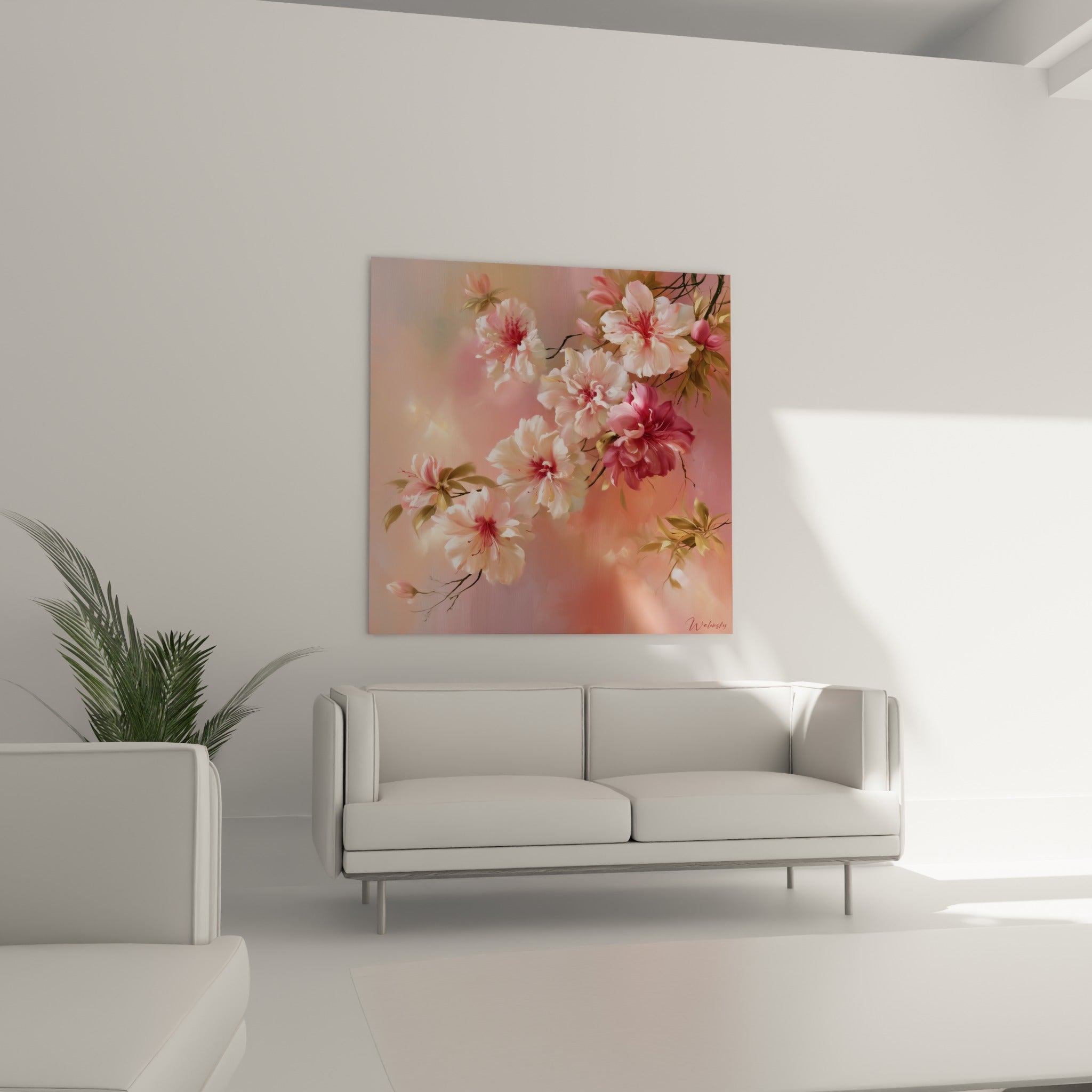 Fleurs d'azalée aux teintes roses et bordeaux, disposées au-dessus d'un canapé dans un salon lumineux