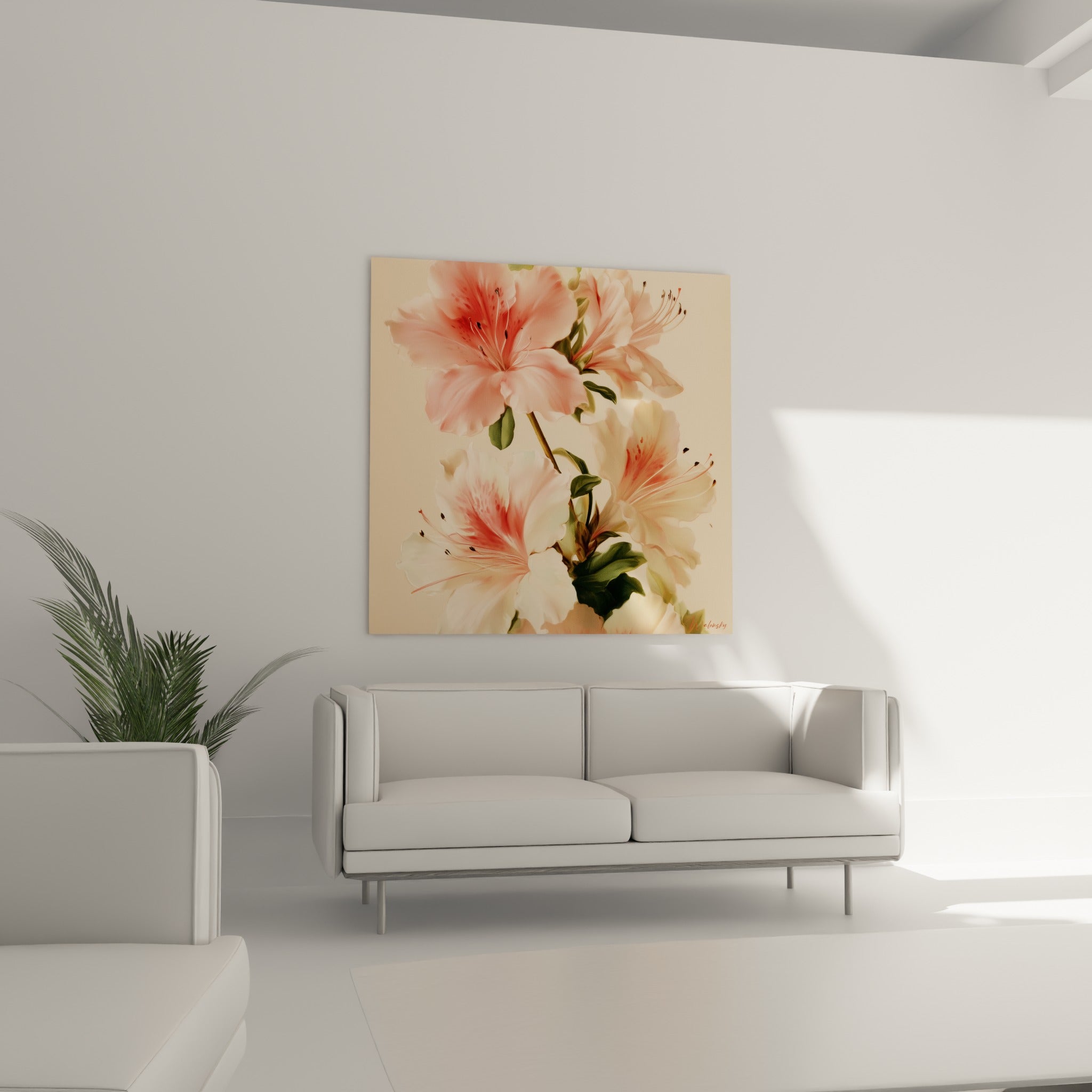 Fleurs d'azalée blanches tachetées de rouge corail au-dessus d'un canapé dans un salon lumineux