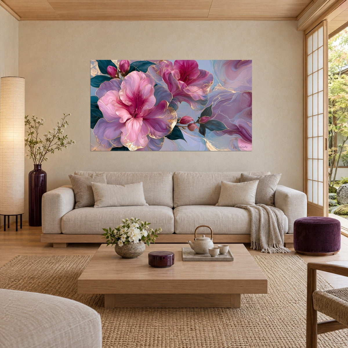 Wall art of pink azaleas with marbled gold threads on a powdery blue background, above a sofa in a bright living room