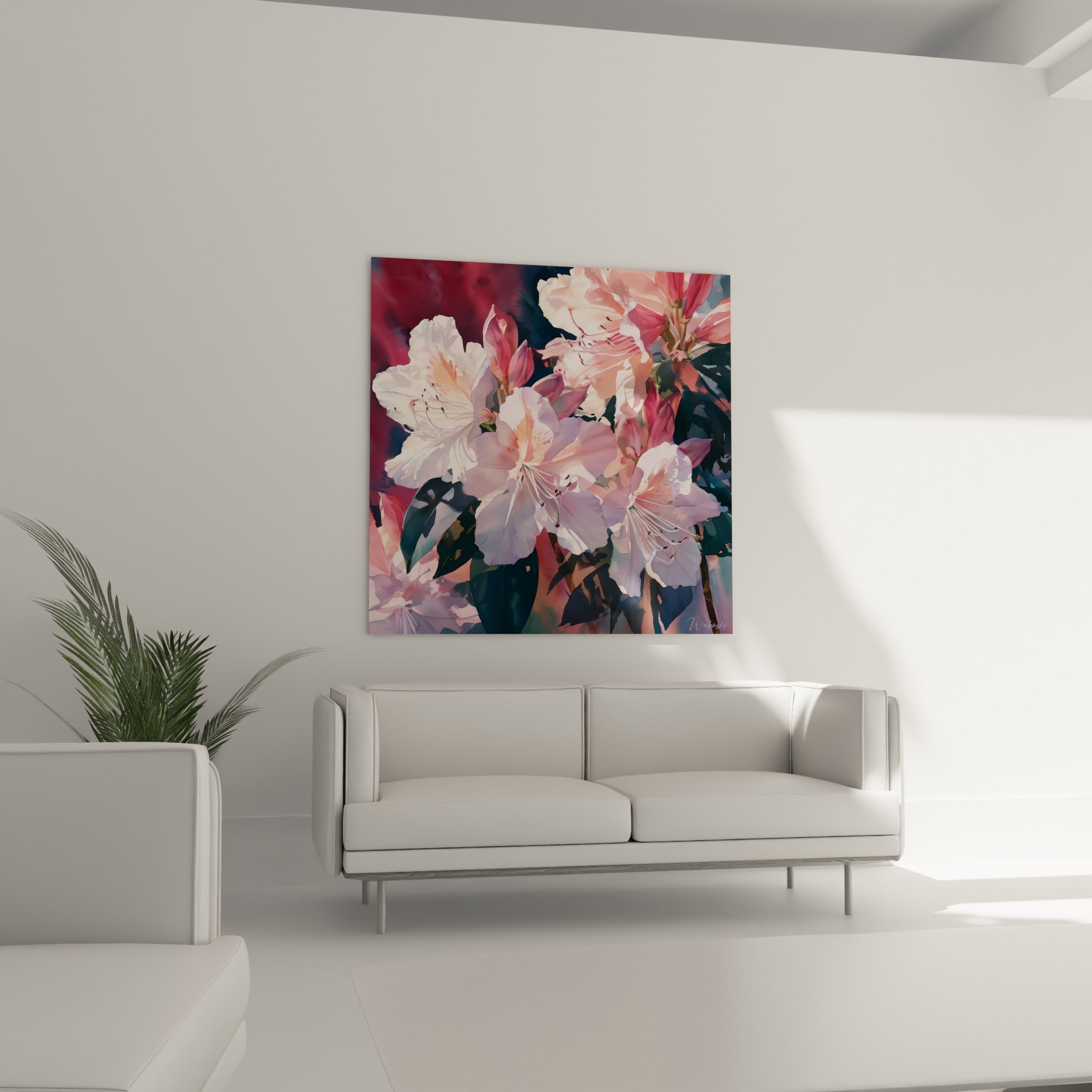 Bouquet d'azalées blanches et rose saumon accroché au-dessus d'un canapé dans un salon lumineux