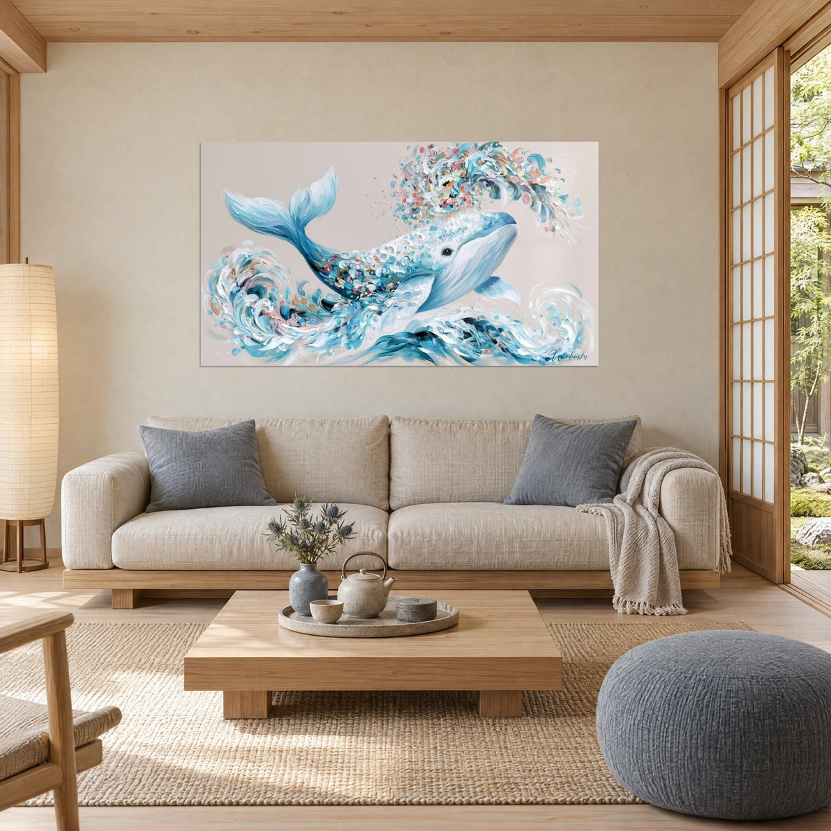 Quadro Cetaceo azzurro pastello che balza da onde spumeggianti, coriandoli rosa e corallo, sopra un divano in un soggiorno luminoso