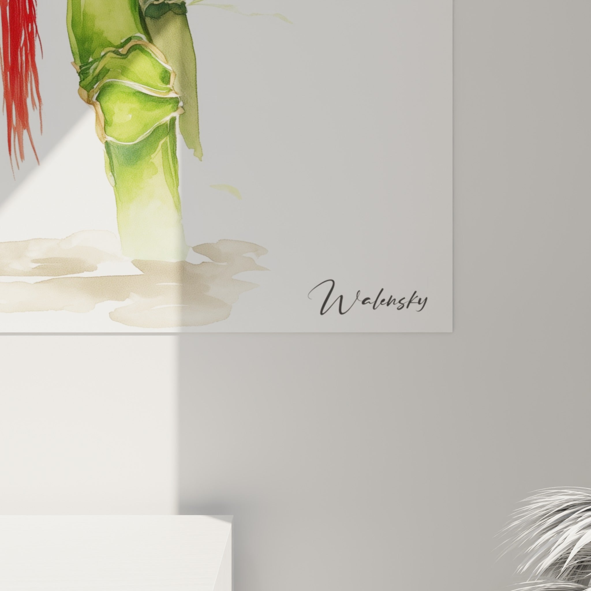 Détail des touches d'aquarelle vert tendre et rouge vermillon sur les tiges de bambou et le pendentif