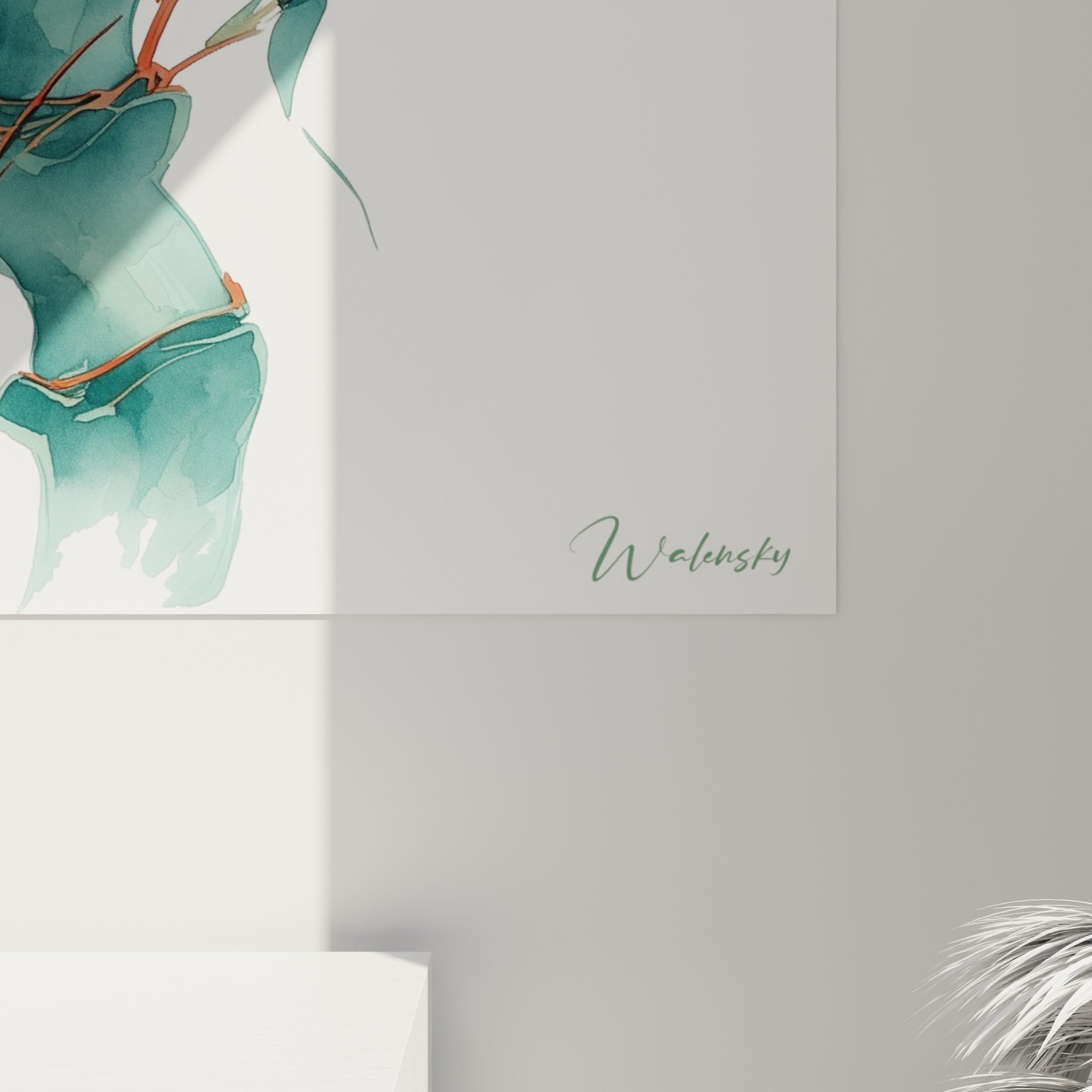 Détail des coulures d'aquarelle vert sarcelle et des liens terracotta noués sur la tige de bambou