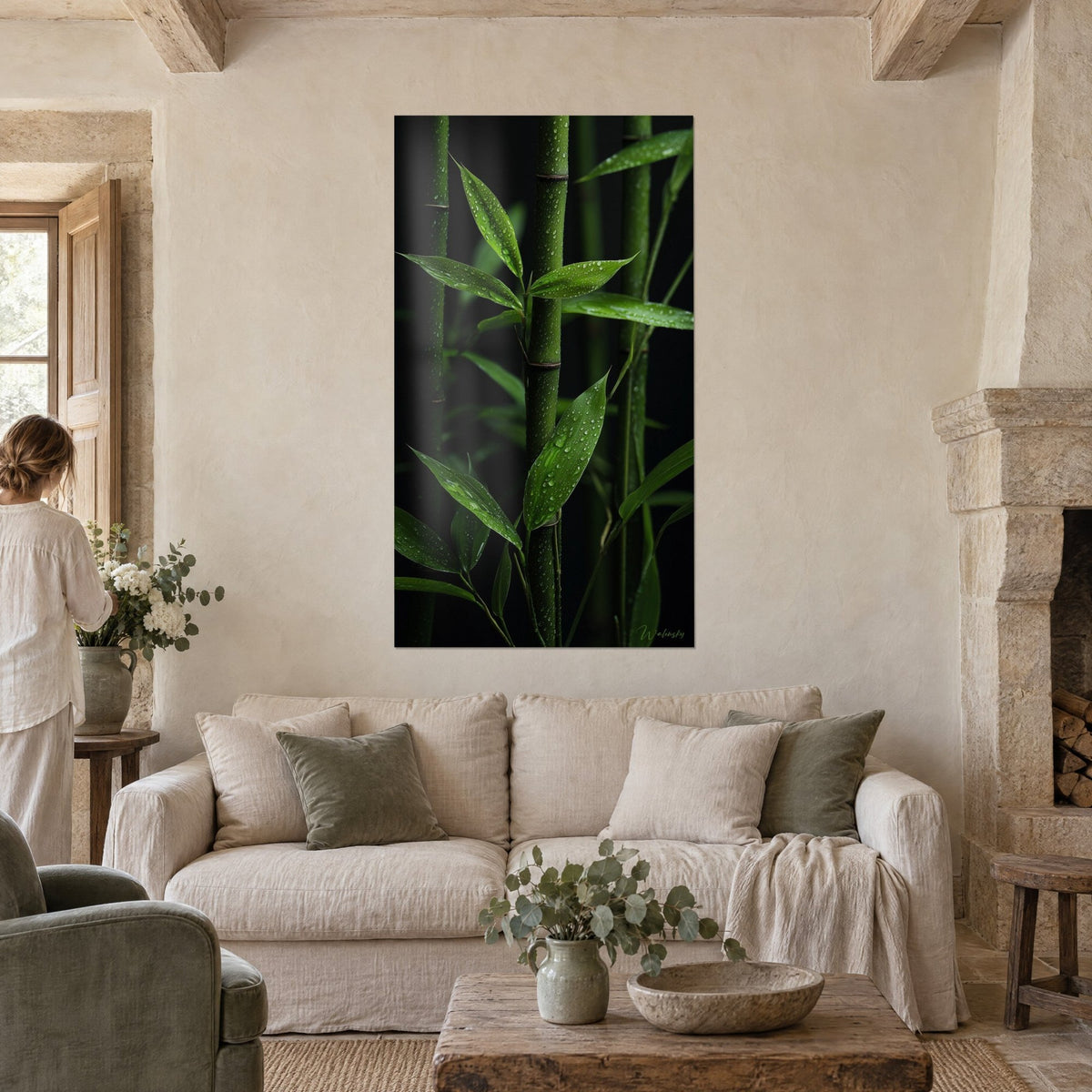 Wall art deep green bamboo stalks covered in droplets, black background, above a sofa in a bright living room