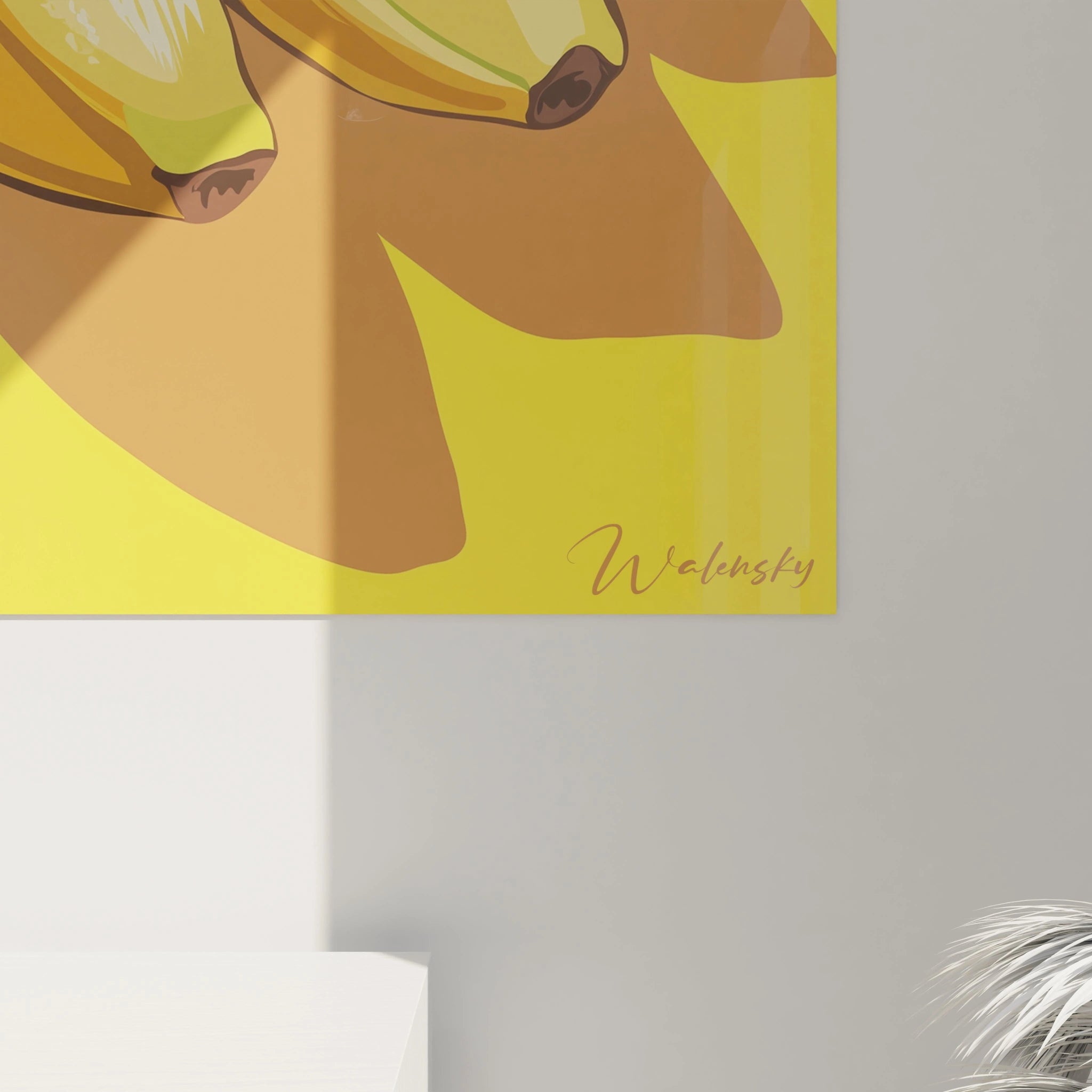 Un tableau banane présentant un régime de bananes en tons chauds, mêlant jaune et marron, sur un fond uni. Les ombres accentuées et les reflets subtils apportent une impression de volume réaliste.







