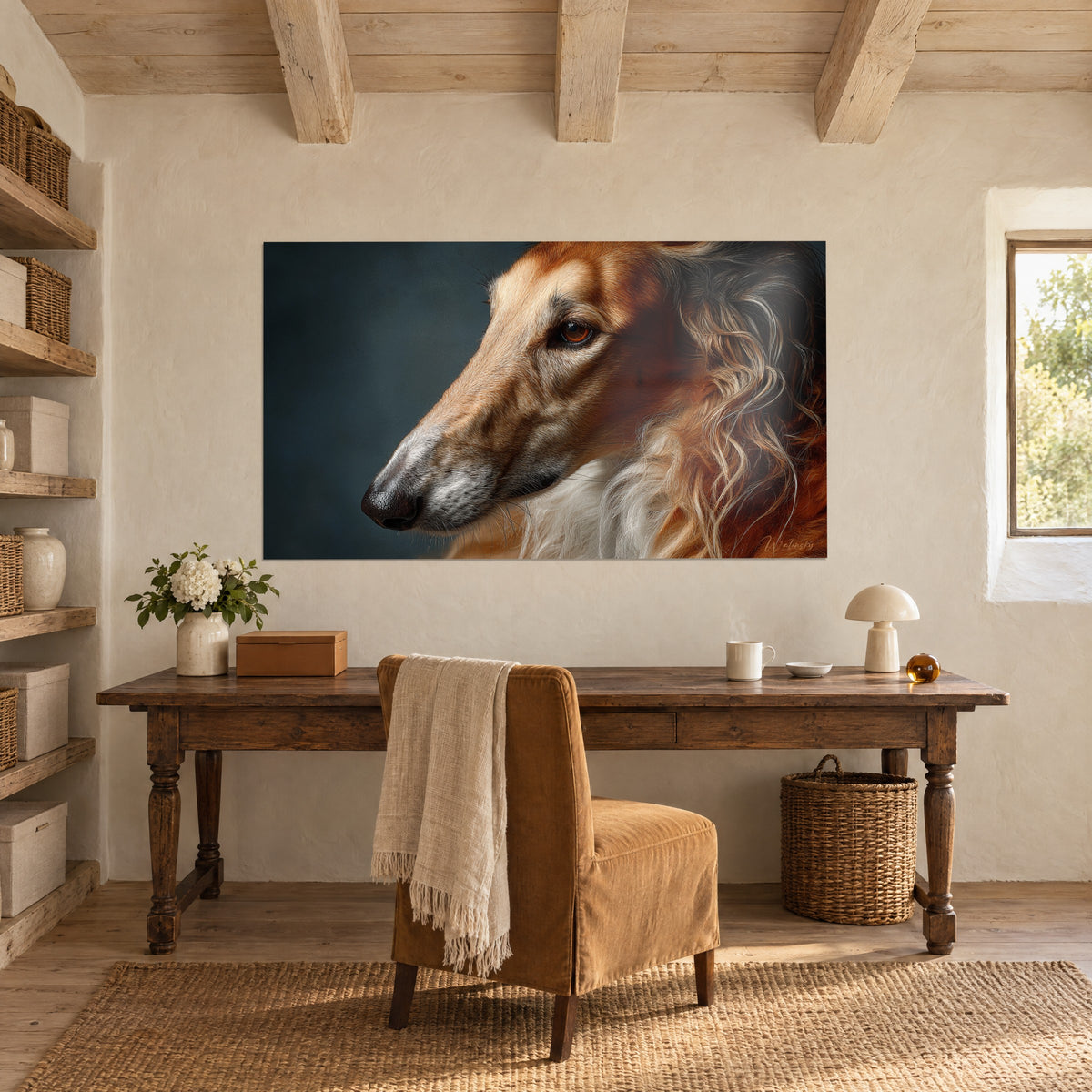 Wall art of a slender greyhound head, golden and white coat, black nose on a blue-grey background, facing a wooden desk in a sunlit room