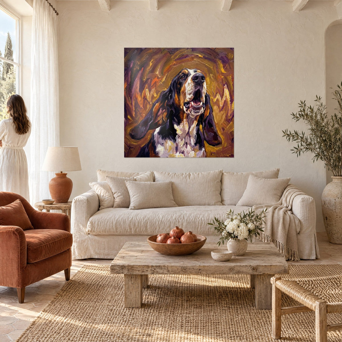 Wall art of a howling basset hound, black muzzle raised, violet ears and golden ochre background, above a sofa in a bright living room