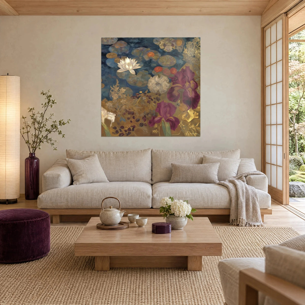 Wall art white water lily on midnight blue pond, purple irises and golden foliage, above a sofa in a bright living room