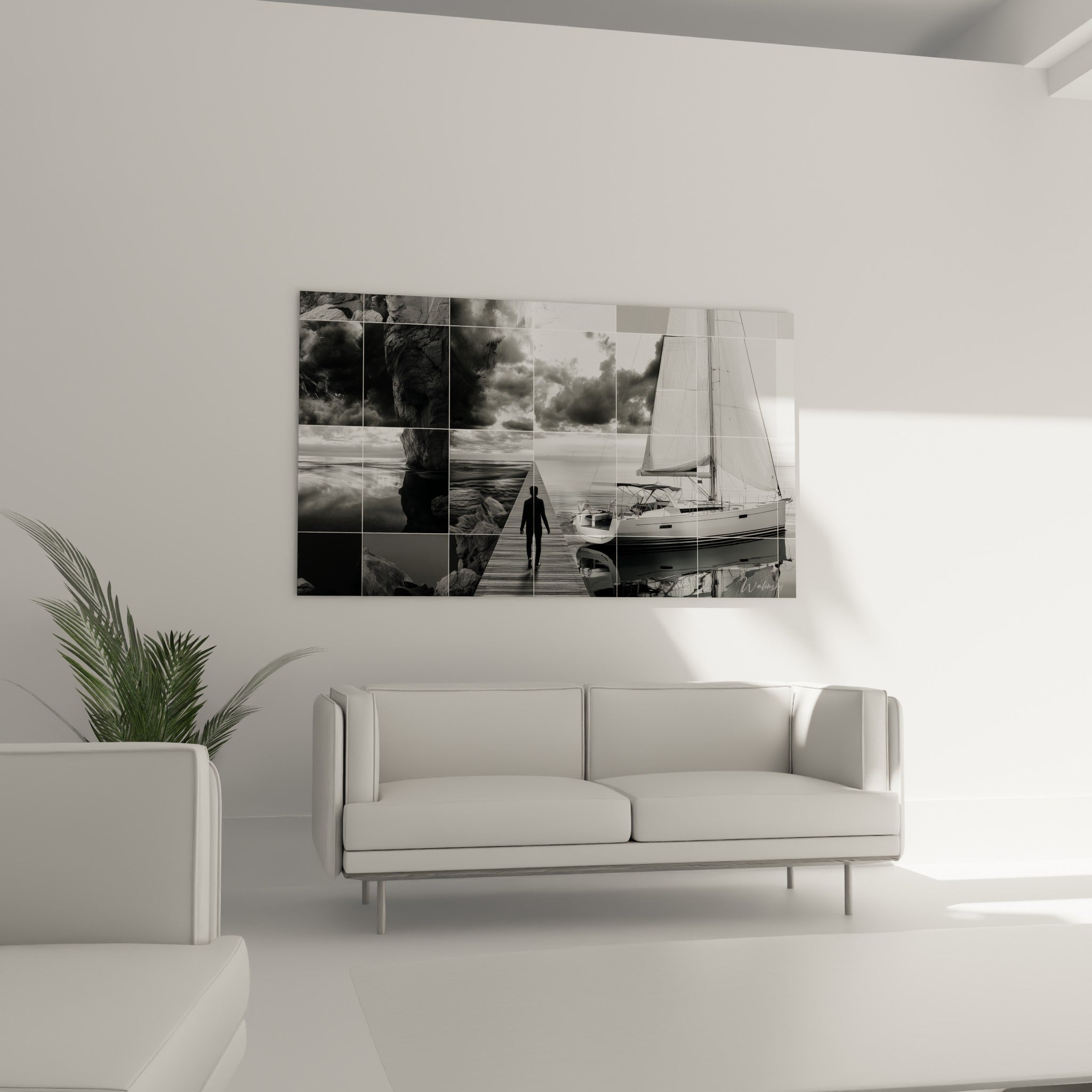 Homme silhouetté avançant vers un bateau à voile, tons anthracite et blanc, au-dessus d'un canapé dans un salon lumineux