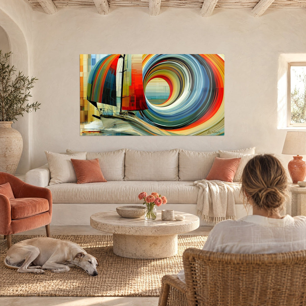 Tableau voilier lancé dans un tourbillon de rayures rouges et bleues, au-dessus d'un canapé dans un salon lumineux