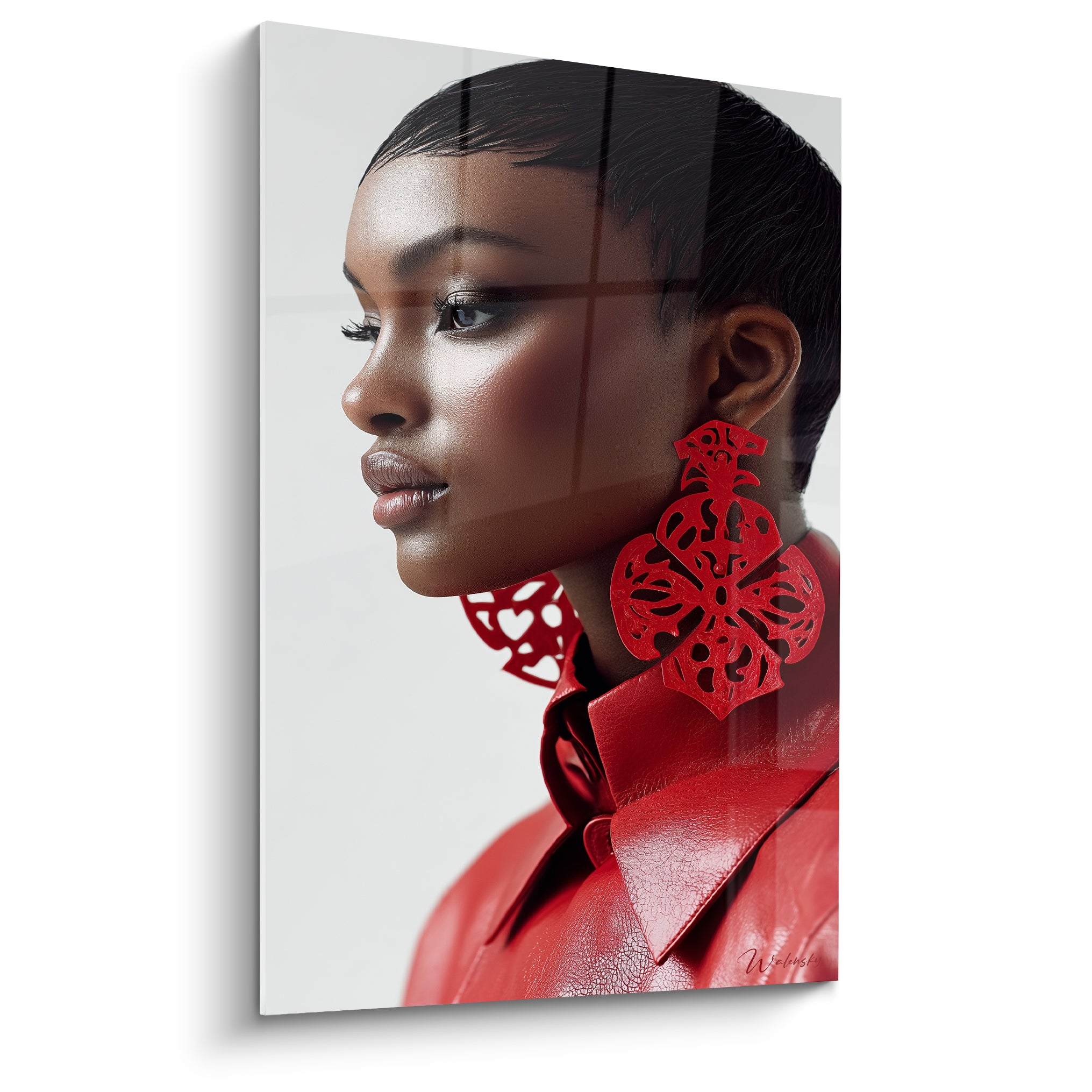 Femme au profil serein, veste rouge et boucles ajourées, fond anthracite dégradé raffiné