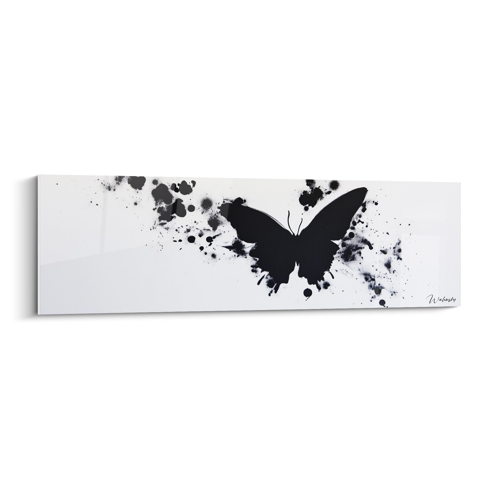 Tableau papillon noir avec éclaboussures artistiques sur fond blanc par Walensky