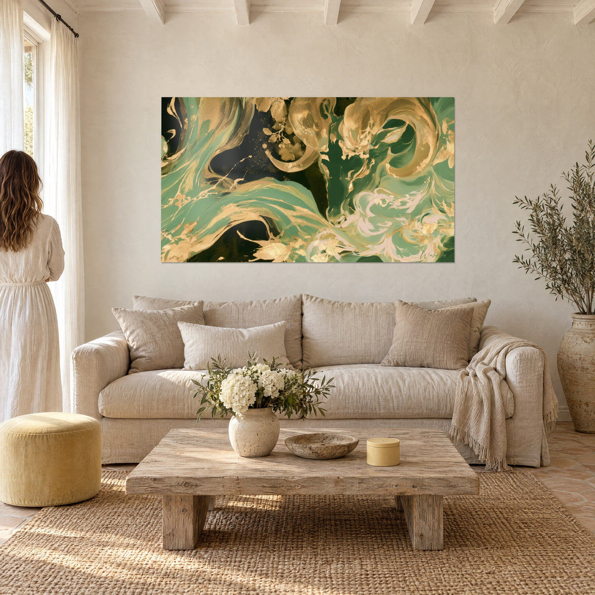 Wall art ram horns in sage green and gold scrolls on black background, above a sofa in a bright living room