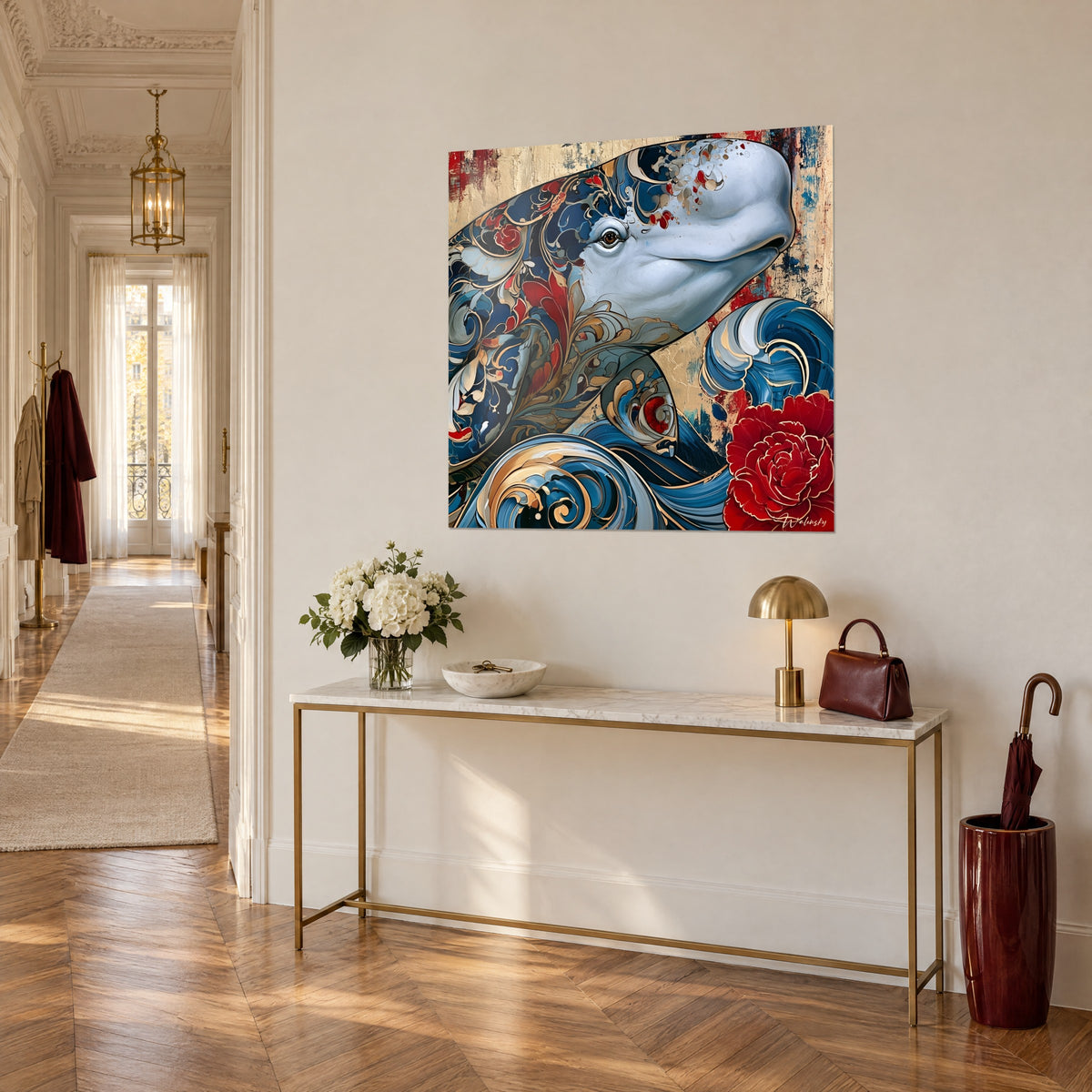 Quadro beluga con arabeschi dorati, onde blu a volute e peonia rossa, su una console in ottone, vista di tre quarti