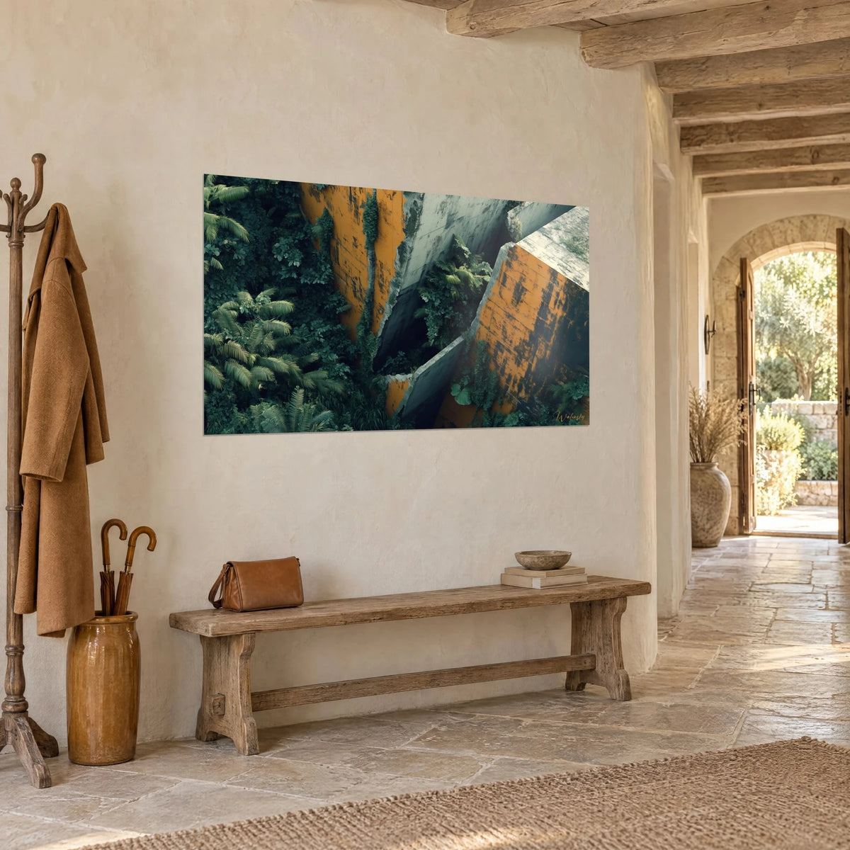Wall art of an ochre and grey concrete ruin pierced by ferns and dark green ivy, hung on a stone wall, three-quarter view