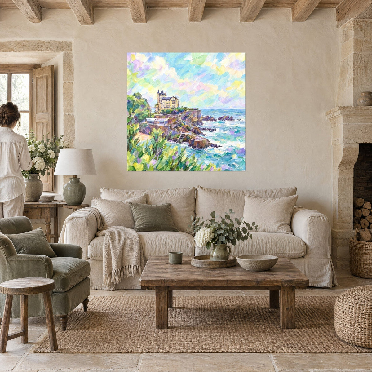 Wall art villa with gilded turrets on a cliff, soft pink and blue sky, turquoise sea, above a sofa in a bright living room