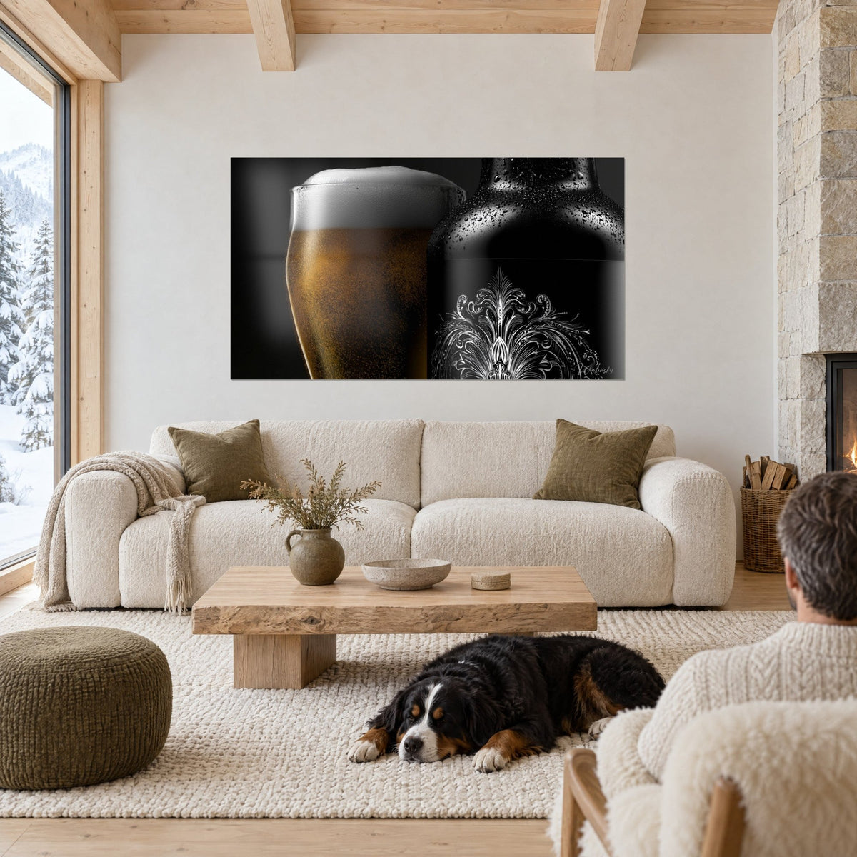 Tableau chope de bière dorée surmontée de mousse blanche et bouteille noire perlée, chien noir et blanc au-dessus d'un canapé dans un salon lumineux