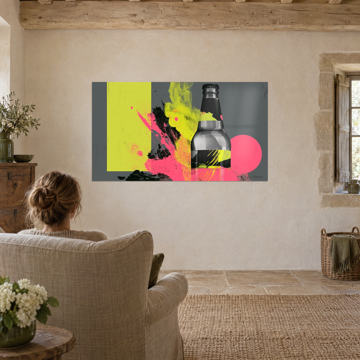 Wall art beer bottle striped in black and neon yellow, large pink disc, linen armchair, living room with pale stone floor
