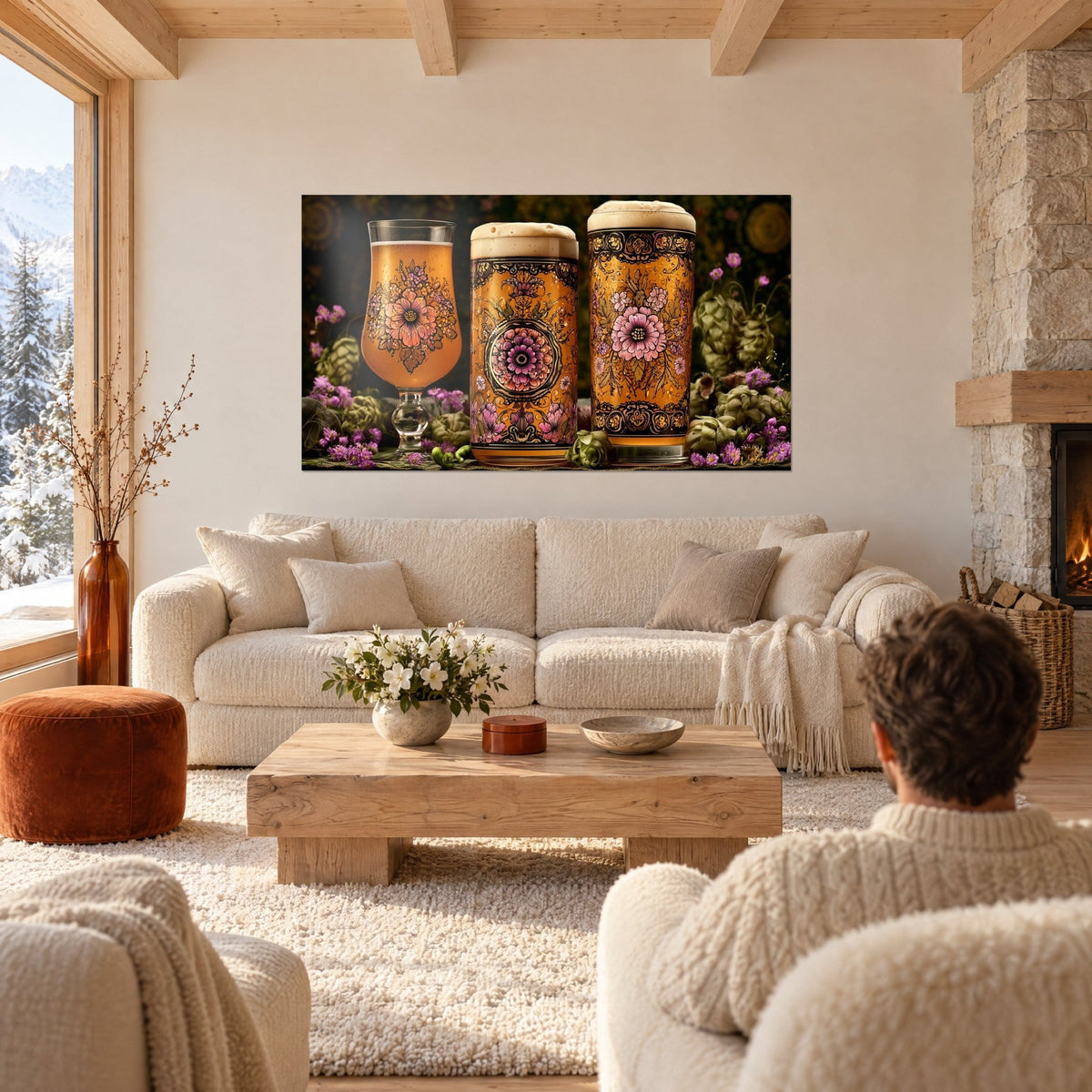 Wall art amber beer glasses decorated with pink flowers and green hops, creamy foam, above a sofa in a bright living room