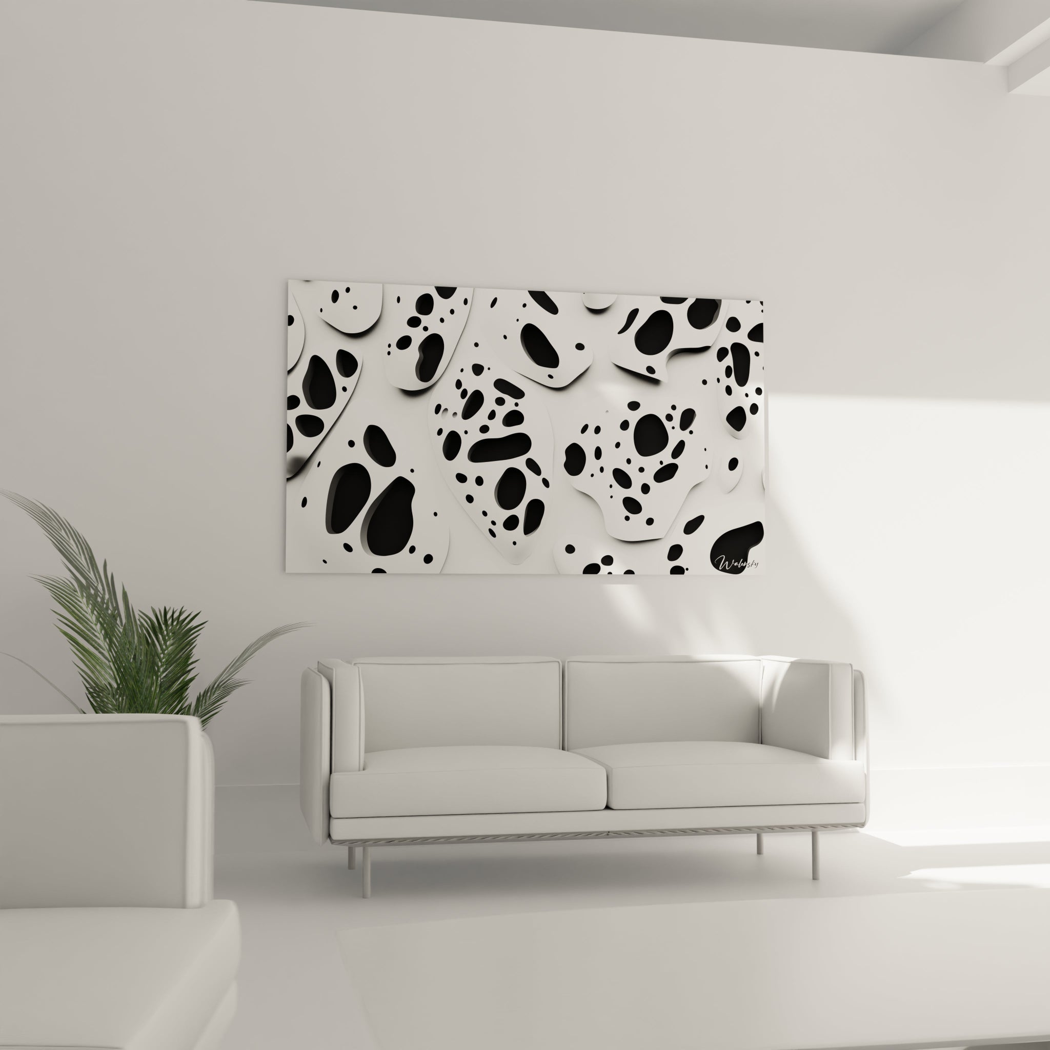 Tableau tacheté noir et blanc Walensky décorant un salon moderne avec un canapé blanc