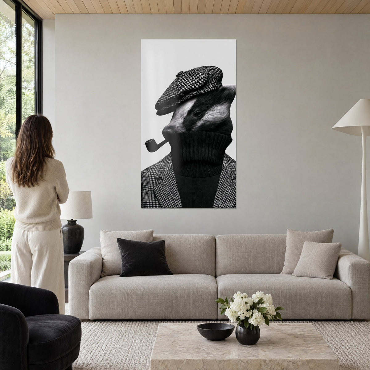 Wall art badger dressed as a gentleman, black and white houndstooth flat cap, ebony pipe, above a sofa in a bright living room