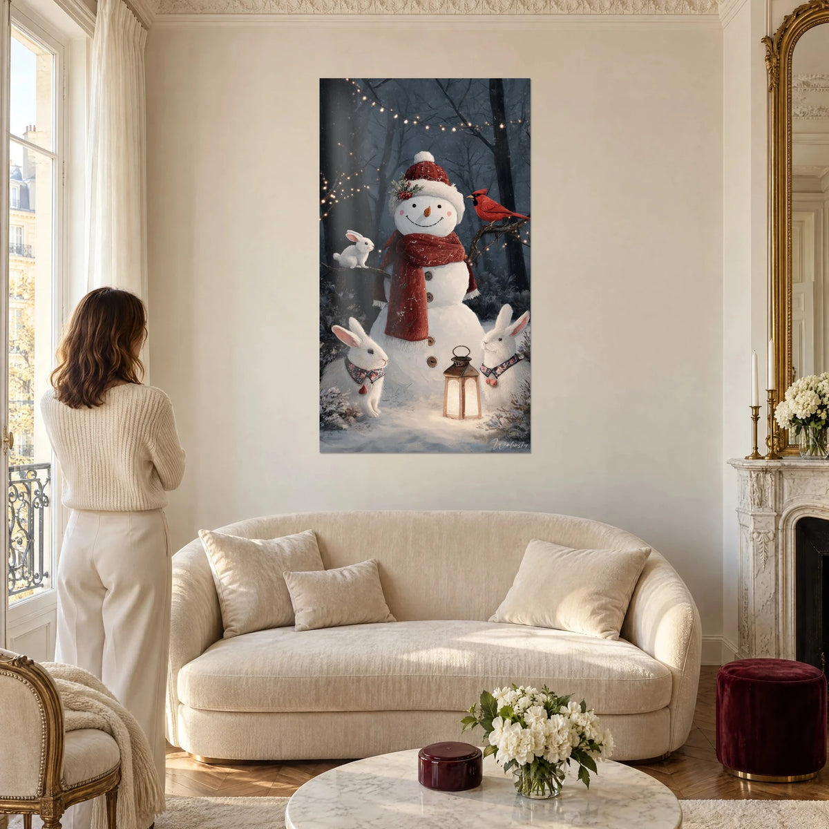 Wall art snowman with red scarf, white rabbits and golden lantern, midnight blue forest, above a sofa in a bright living room