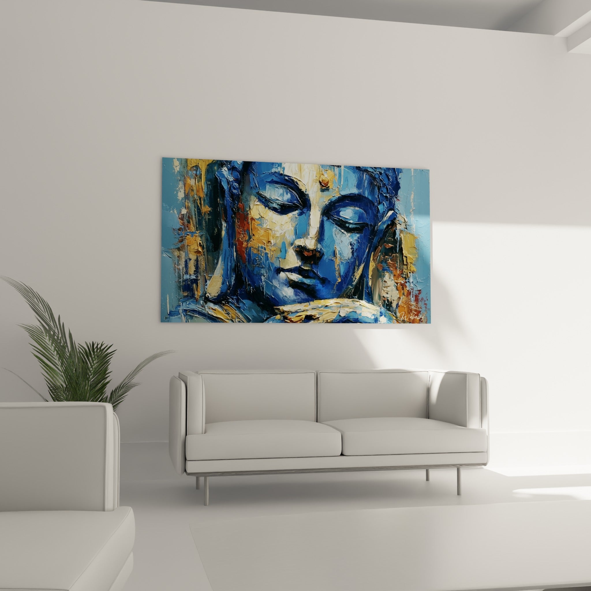 Statue de Bouddha peinte en bleu profond et or, au-dessus d'un canapé dans un salon lumineux