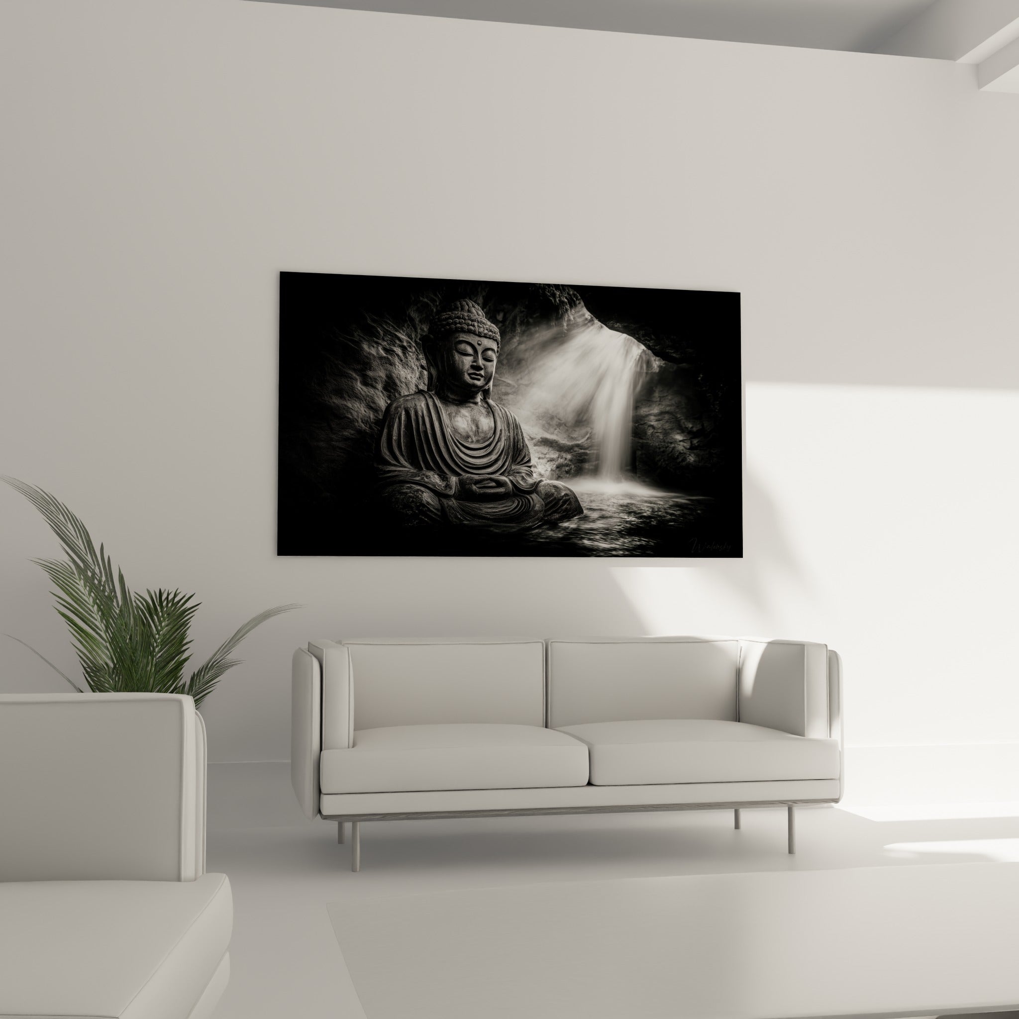 Bouddha sculpté aux tons gris et noirs installé au-dessus d'un canapé dans un salon lumineux