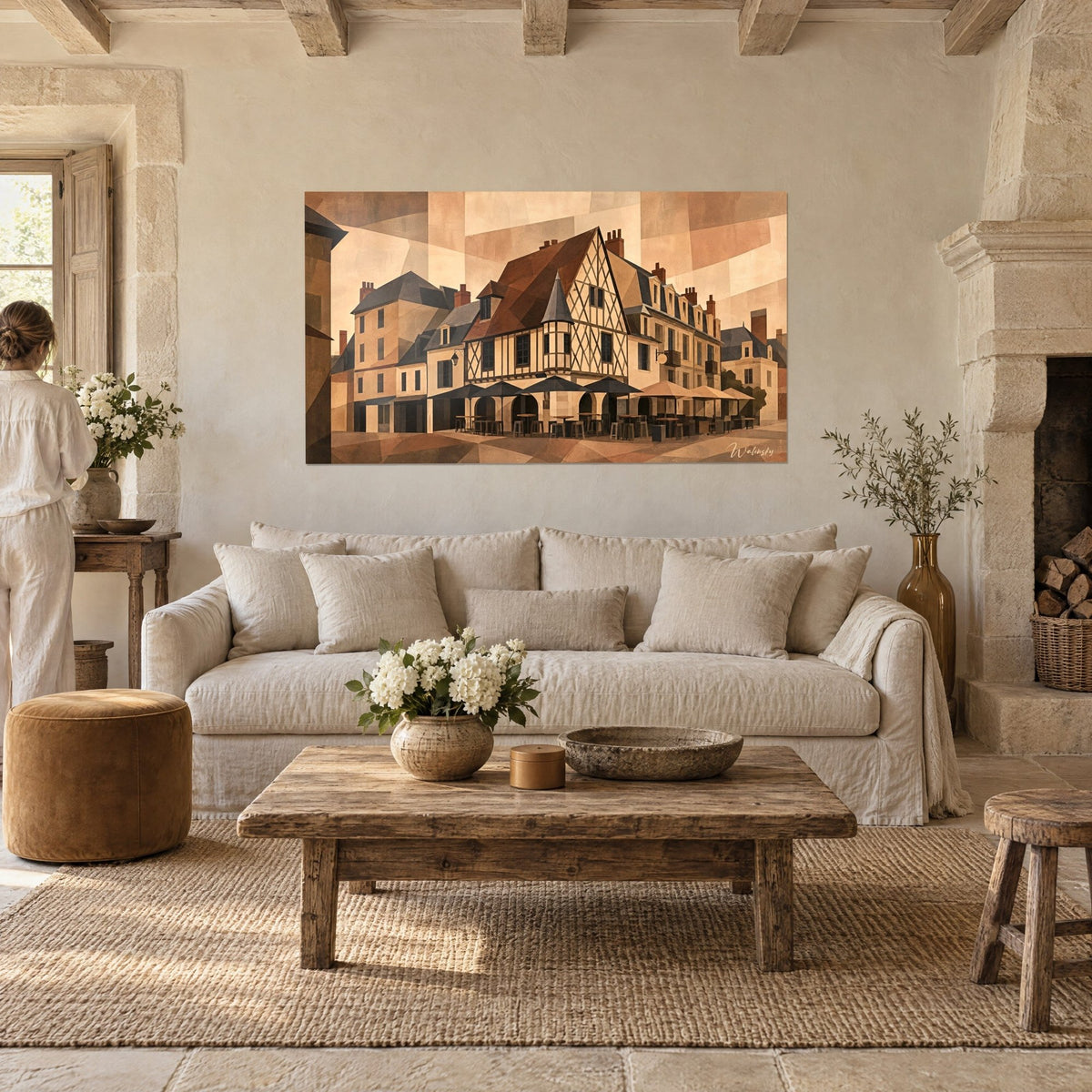 Wall art half-timbered house with brown diamond patterns, copper roof and terrace with black parasols, above a sofa in a bright living room