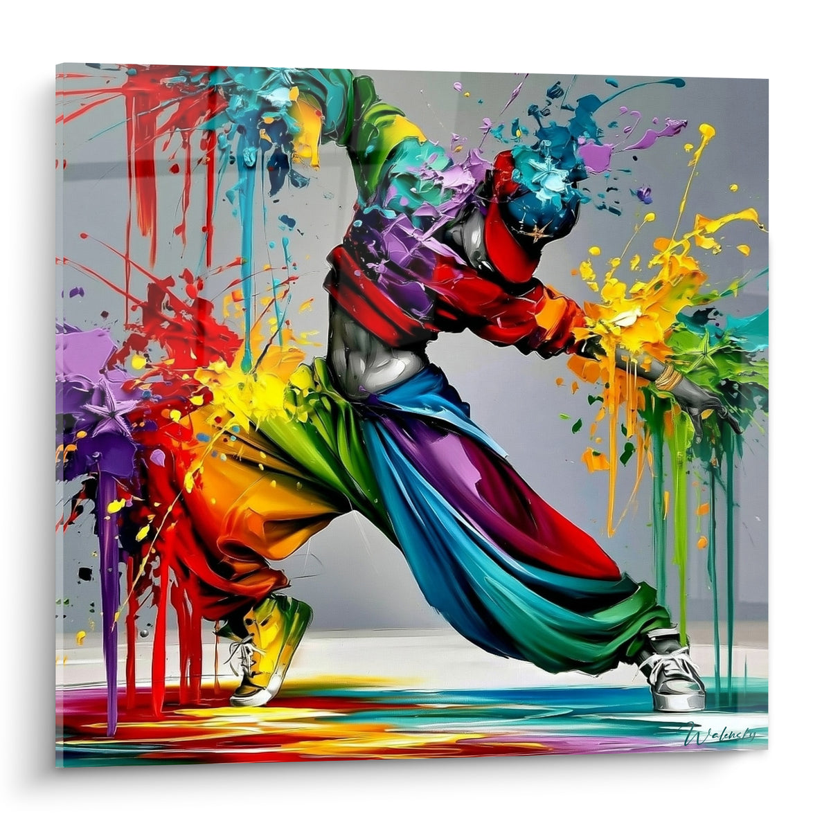 Danseur breakdance figé en freeze, éclaboussures rouge, jaune et bleu turquoise sur fond gris