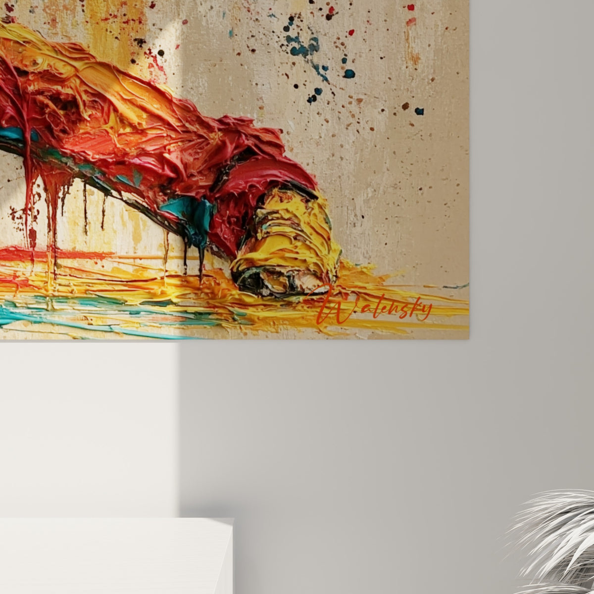 Empâtements épais de peinture rouge, bleu sarcelle et jaune doré sur la toile breakdance accrochée