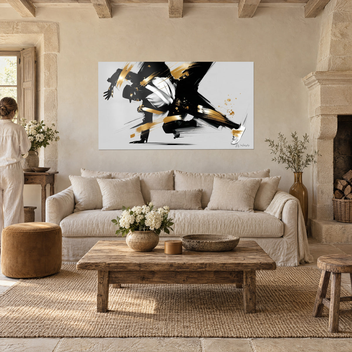 Tableau danseur de breakdance en noir et blanc, bandes dorées, main tendue vers le sol, au-dessus d'un canapé dans un salon lumineux