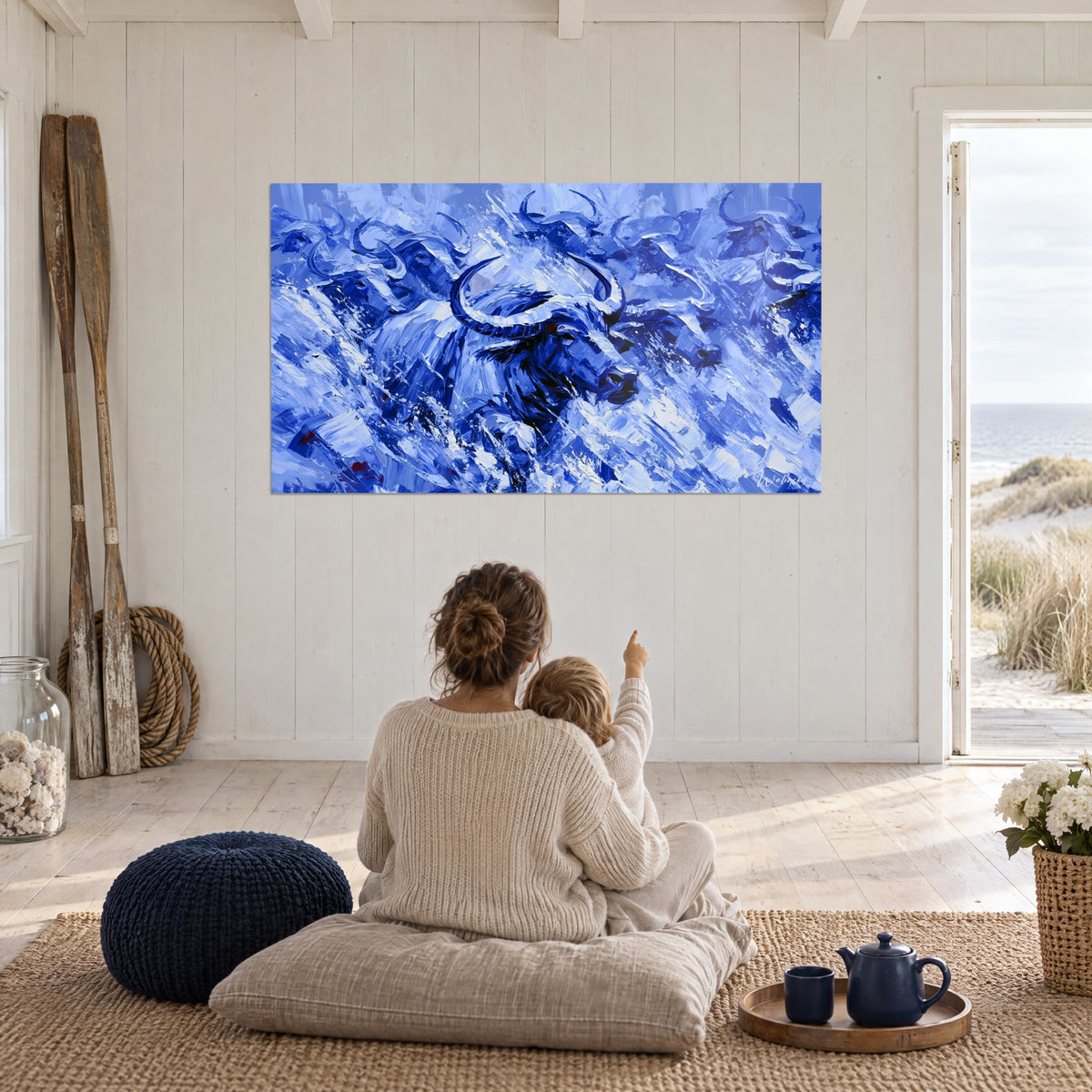 Wall art buffalo herd swirling in azure and white, glossy black horns, mother and child seen from behind, seaside house
