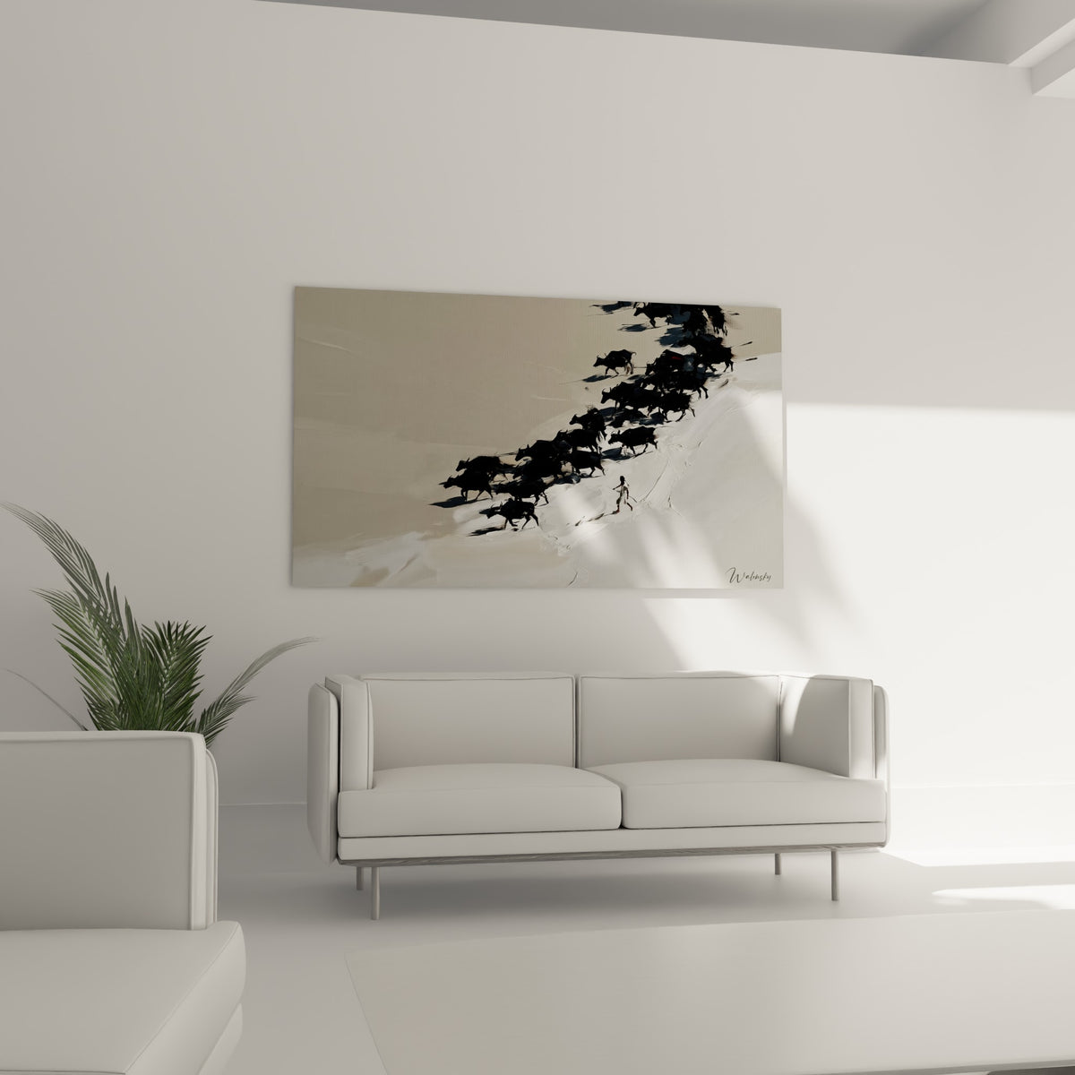 Silhouette humaine parmi les buffles anthracite, contraste beige et noir, au-dessus d'un canapé dans un salon lumineux