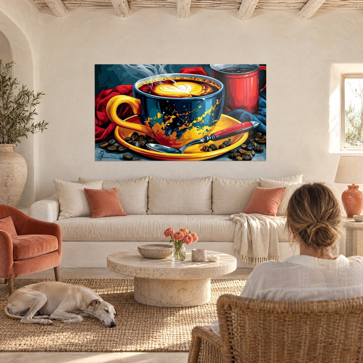 Quadro tazza blu notte fumante con piattino giallo e schiuma a forma di cuore, una donna di spalle sopra un divano in un soggiorno luminoso