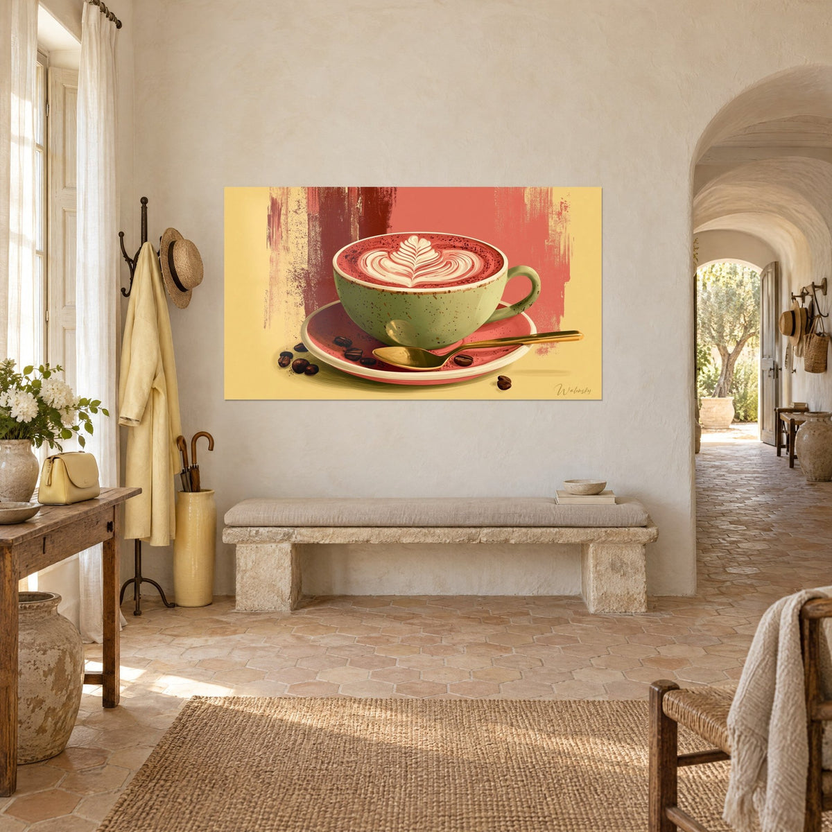 Obraz Cappuccino z latte art w kształcie liścia, szałwiowozielona filiżanka, złota łyżeczka i ziarna kawy, obok kamiennej ławki