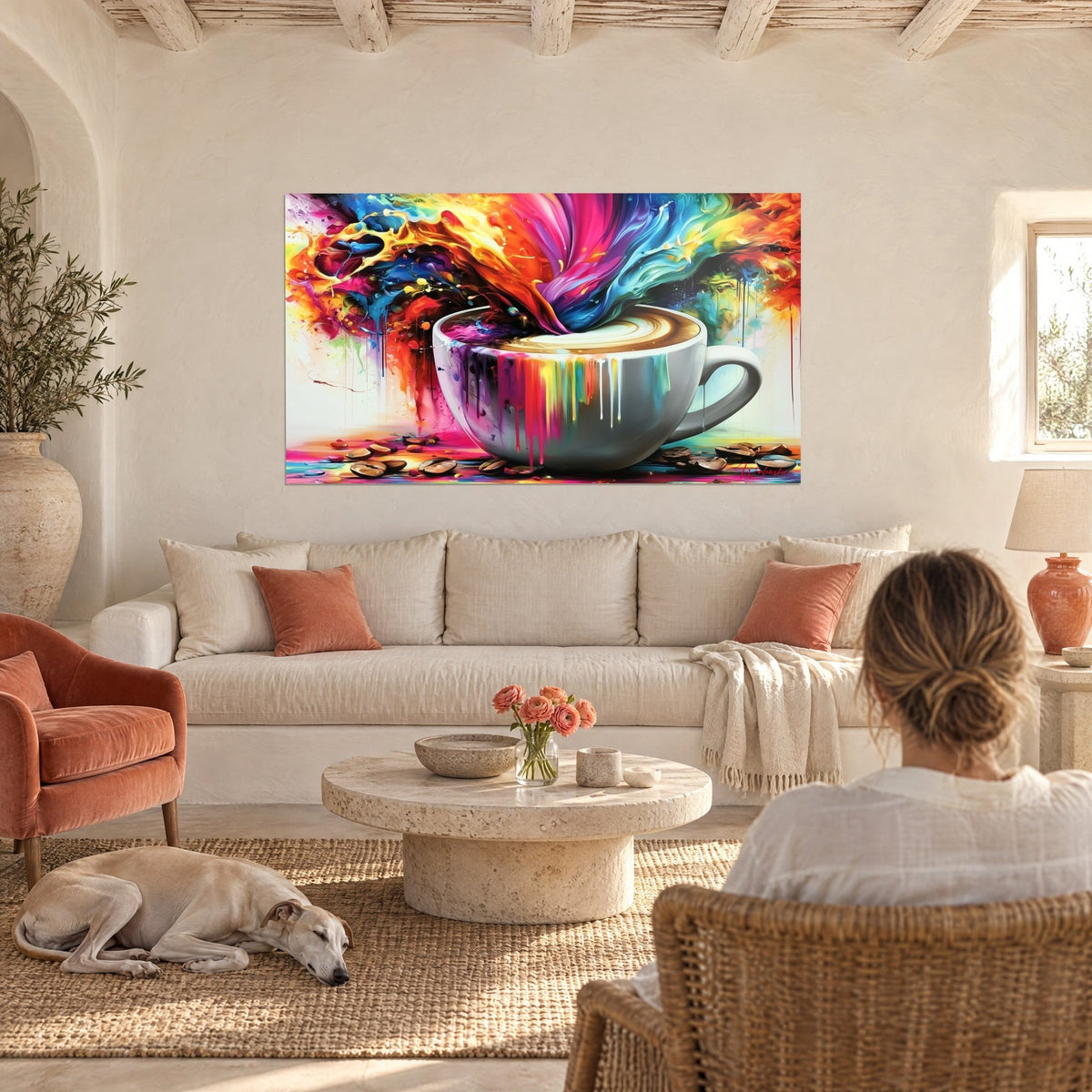 Quadro tazza bianca da cui sale un turbine rosa e arancio, latte cremoso, vista di spalle, sopra un divano in un soggiorno luminoso