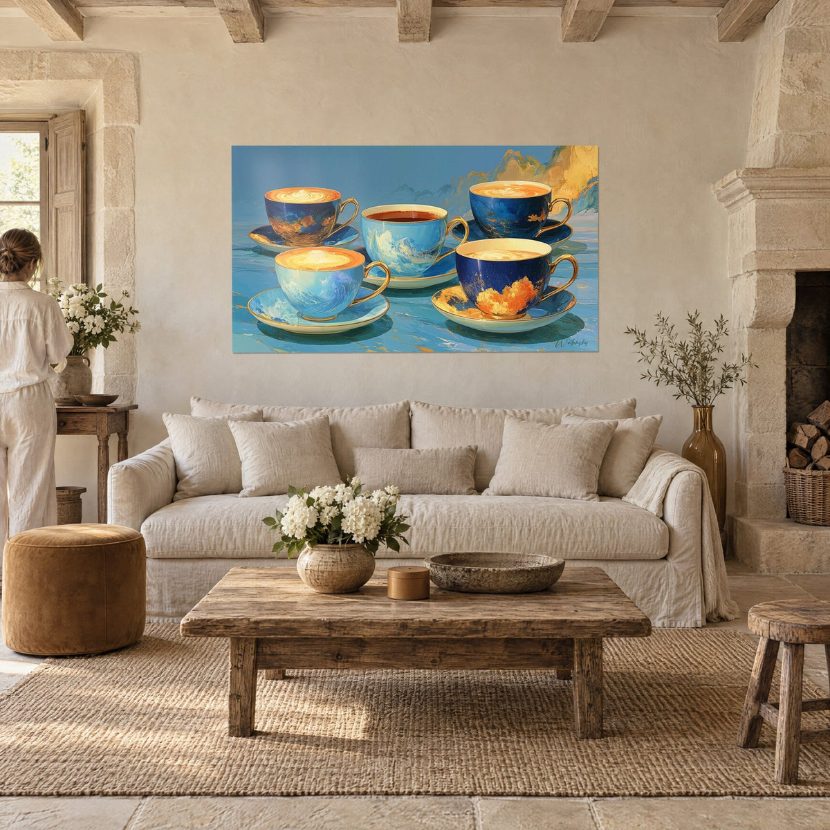 Wall art cobalt blue and gold coffee service, five cups with painted waves, person seen from behind, above a sofa in a bright living room