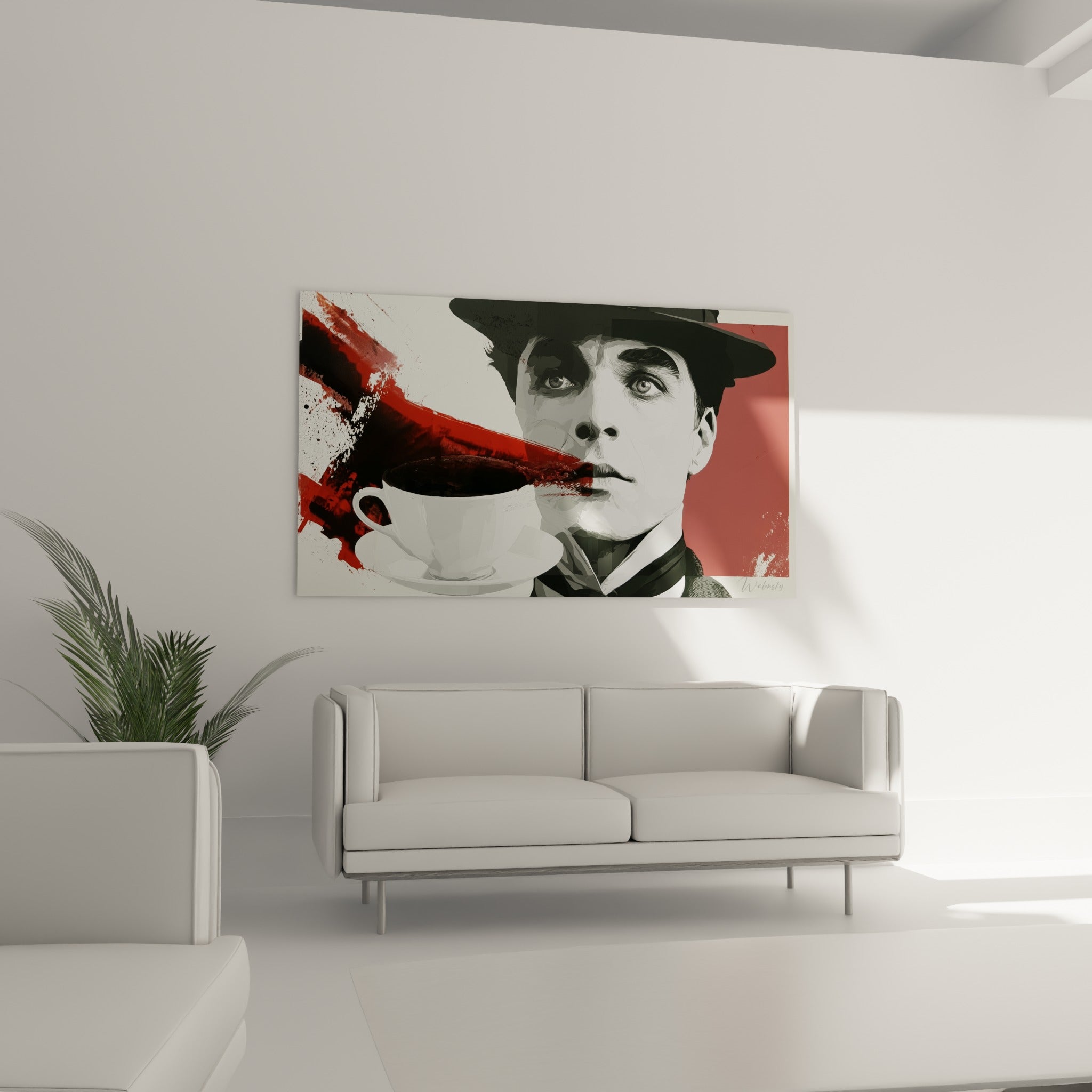 Visage graphique gris anthracite éclaboussé de rouge vif surplombant une tasse blanche, au-dessus d'un canapé dans un salon lumineux
