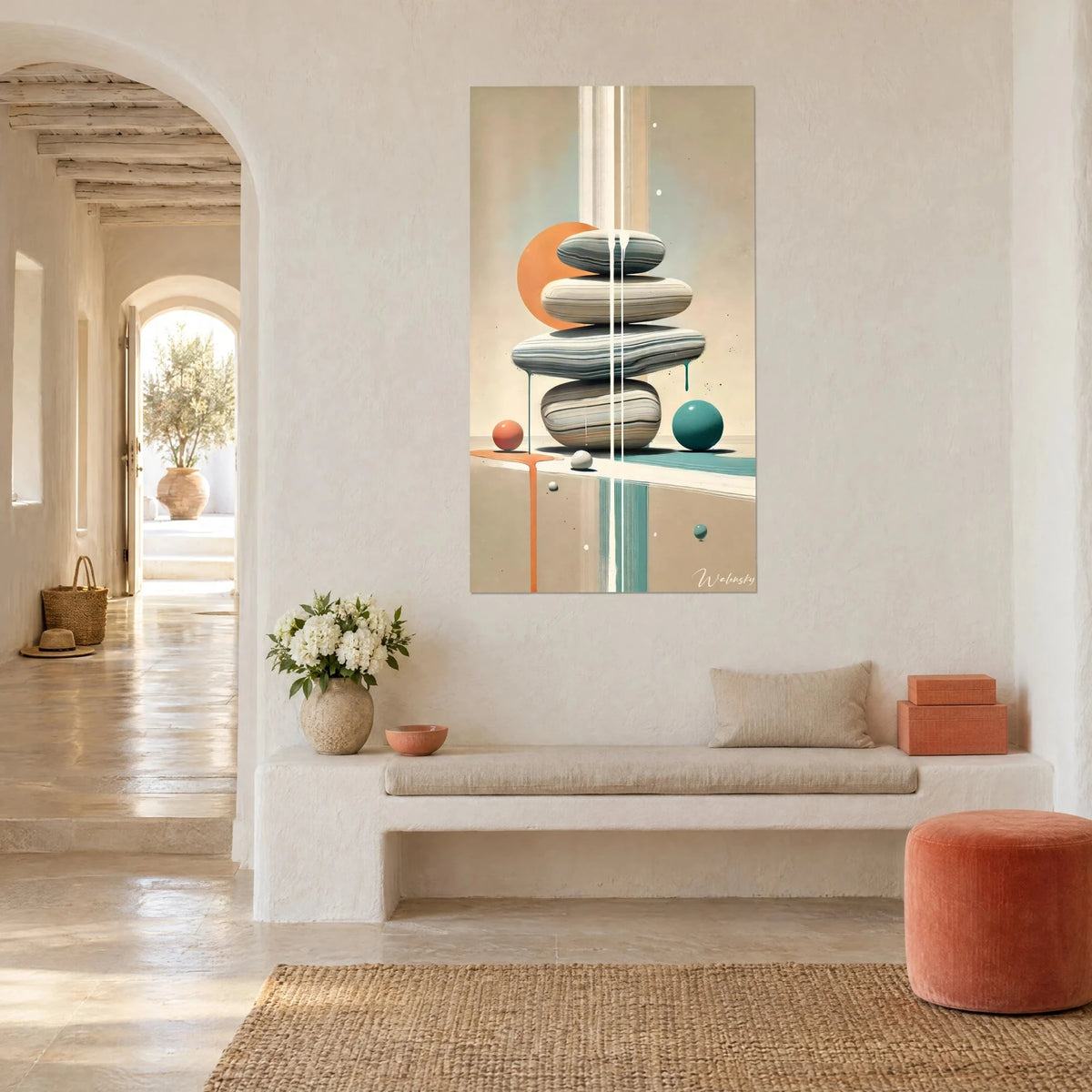 Wall art of a cairn of striped grey and cream pebbles, orange and teal drips, three-quarter view in a Mediterranean home