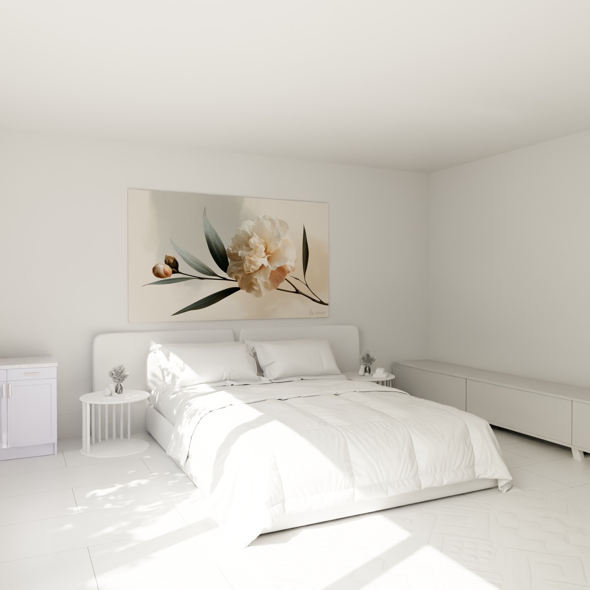 Fleur de camélia crème et anthracite au-dessus d'un lit dans une chambre claire