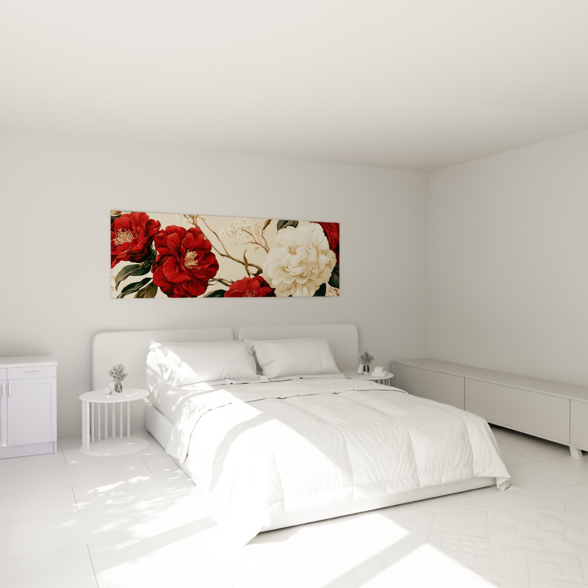 Fleurs de camélia rouge sang et blanc crème accrochées au-dessus d'un lit dans une chambre claire