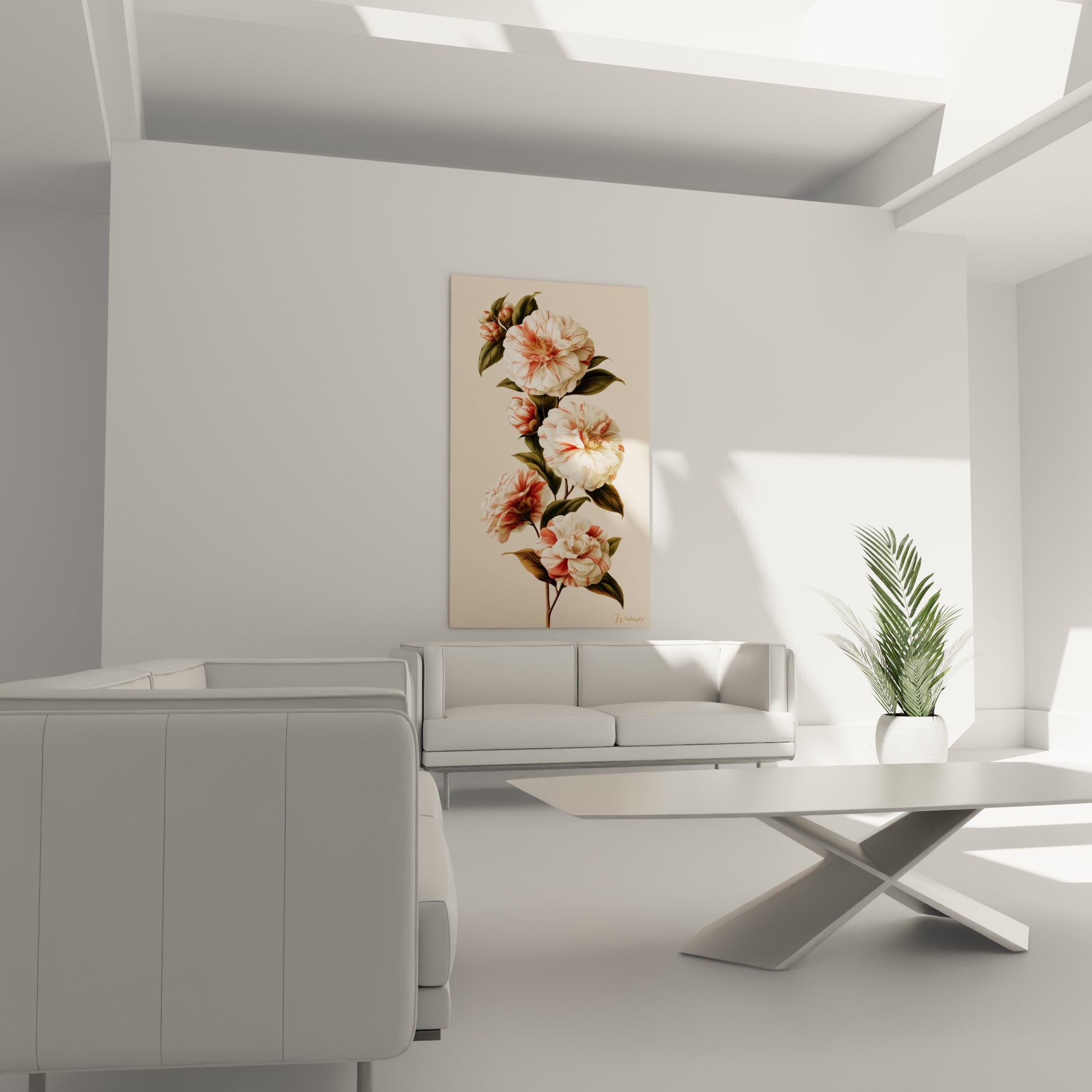 Fleurs de camélia ivoire et rose au-dessus d'un canapé dans un salon lumineux