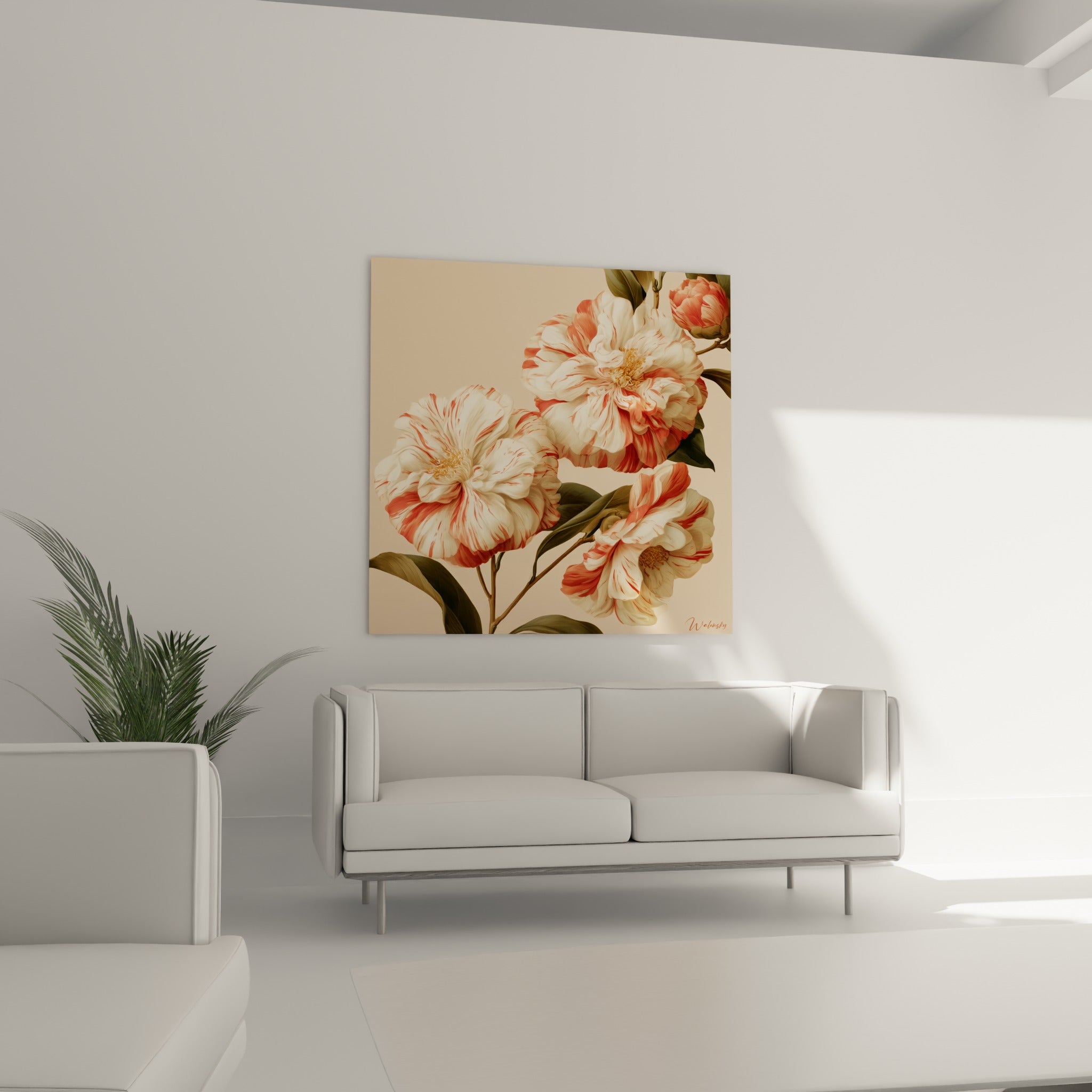 Fleurs de camélia blanches et corail au feuillage vert olive, au-dessus d'un canapé dans un salon lumineux