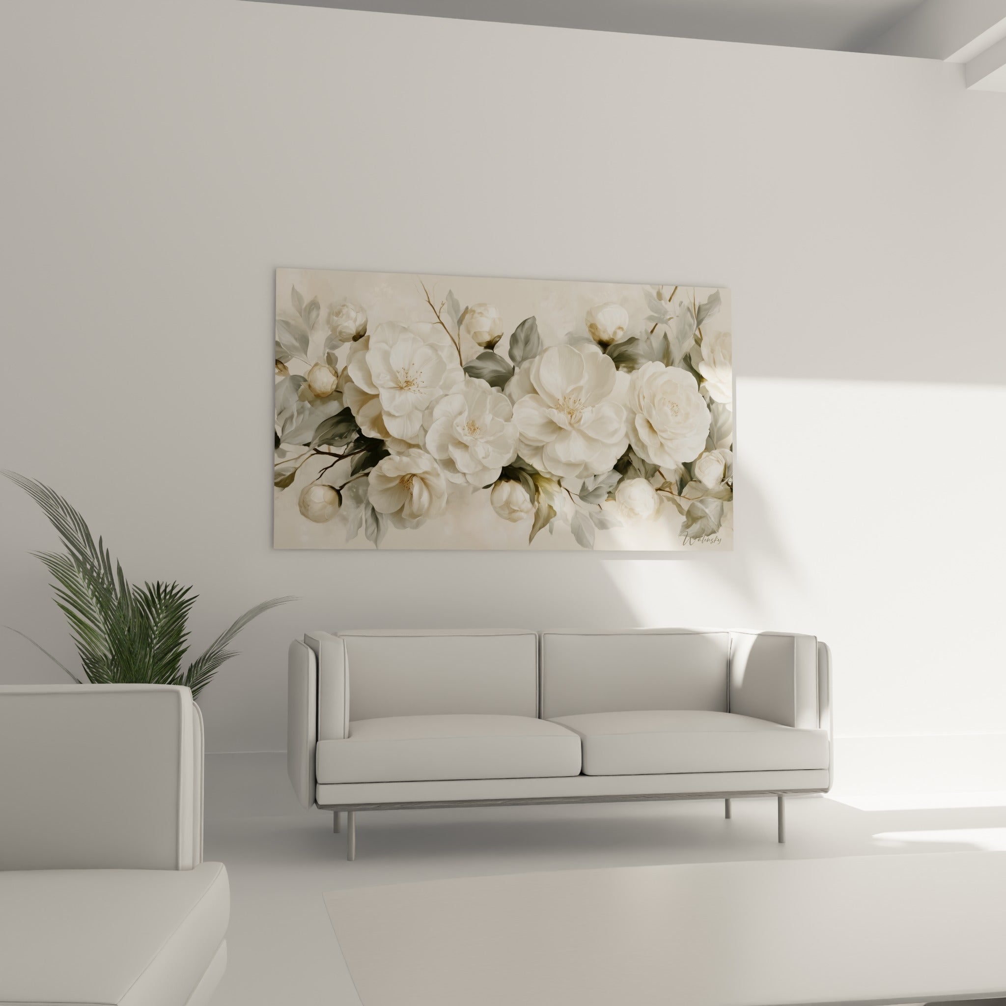 Fleurs de camélia ivoire et vertes disposées au-dessus d'un canapé dans un salon lumineux