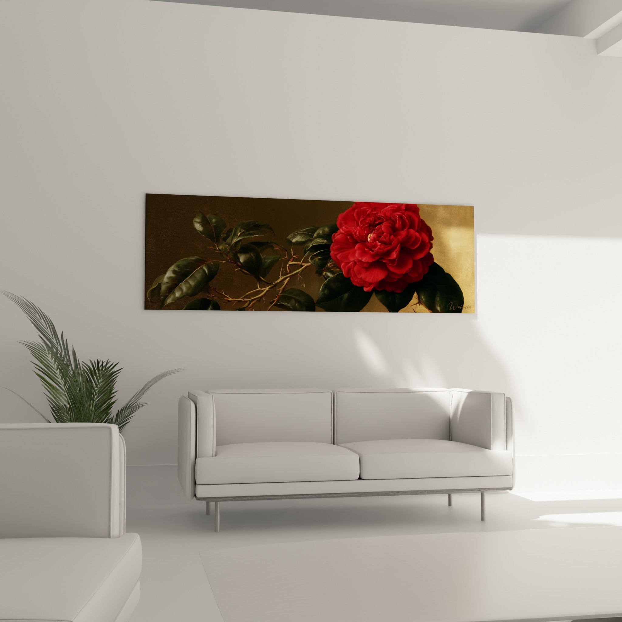 Pétales rouge grenat du camélia et fond ocre doré ornent un mur au-dessus d'un canapé dans un salon lumineux.