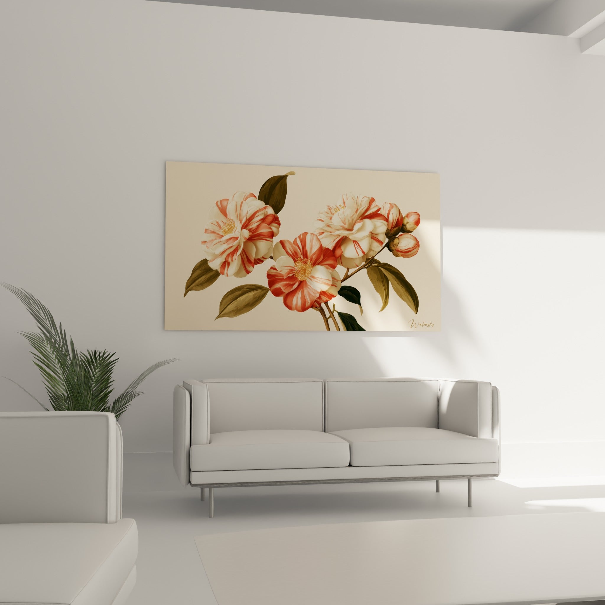 Fleurs de camélia striées de rouge orangé sur fond beige, disposées au-dessus d'un canapé dans un salon lumineux
